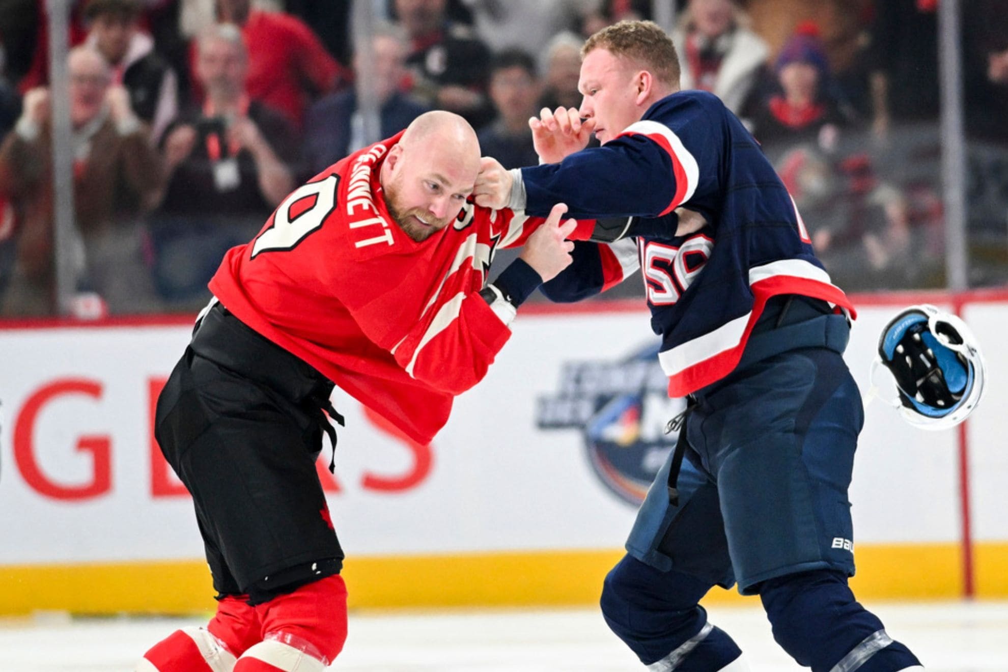 Canadas Sam Bennett, left, fights with United States Brady Tkachuk during the first period of a 4 Nations Face-Off hockey game in Montreal on Saturday, Feb. 15, 2025. (Graham Hughes//The Canadian Press via AP)