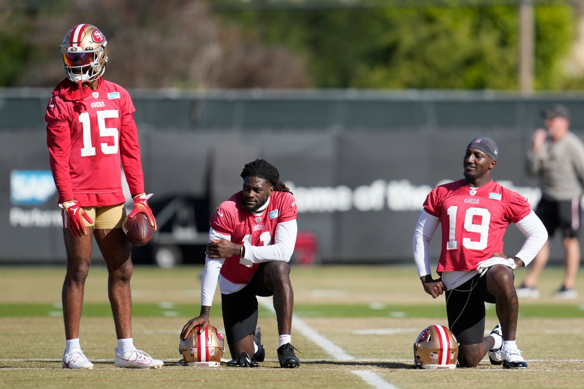 San Francisco 49ers wide receivers Jauan Jennings (15), Brandon Aiyuk, middle, and Deebo Samuel (19) take part in an NFL football practice in Santa Clara, Calif., Thursday, Jan. 25, 2024. The 49ers are scheduled to play the Detroit Lions Sunday in the NFC championship game.