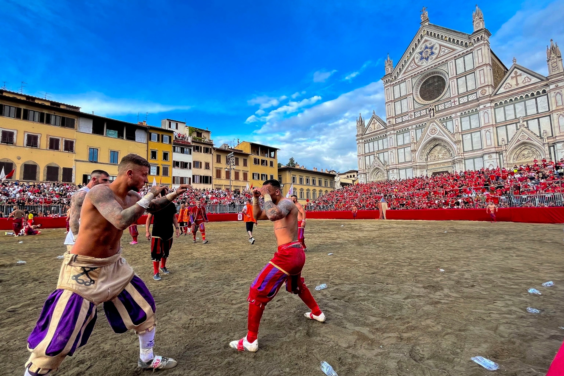What is calcio storico, a mixture of football, rugby and wrestling: 27 players looking to score goals by hitting each other