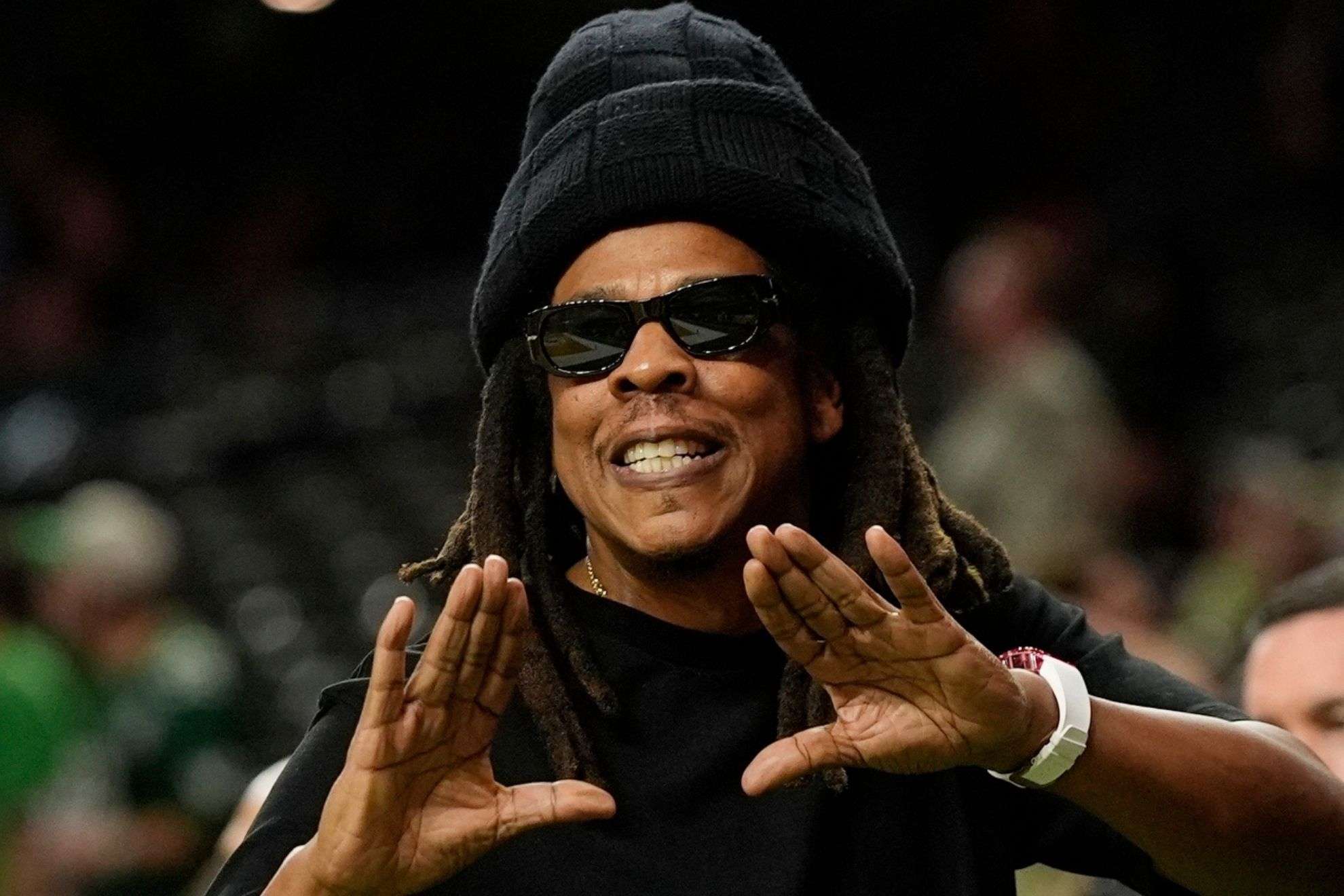 Jay-Z taking woman with him to his exclusive suit goes viral in resurface video