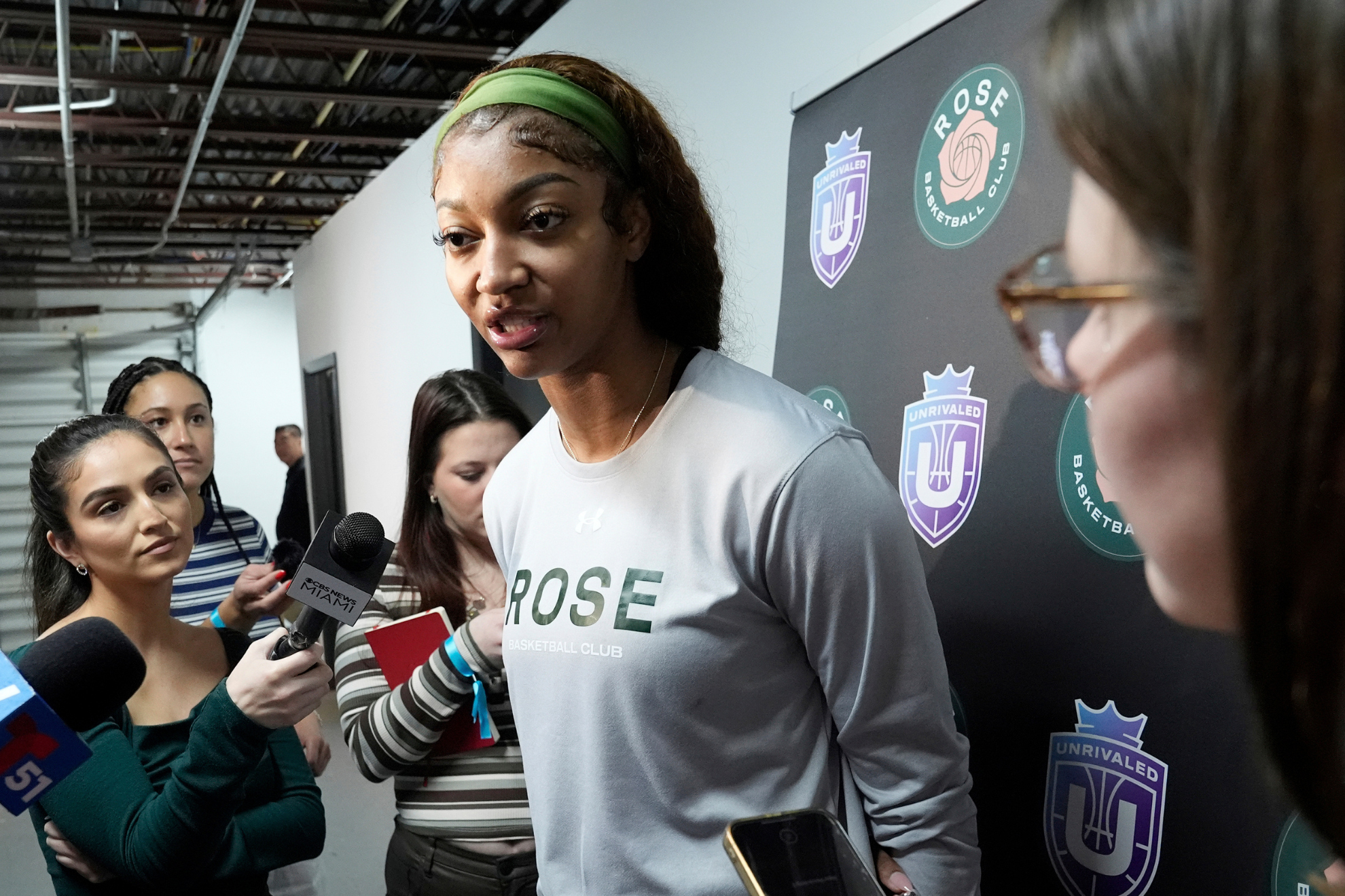 Angel Reese speaks to the media during the Unrivaled season.