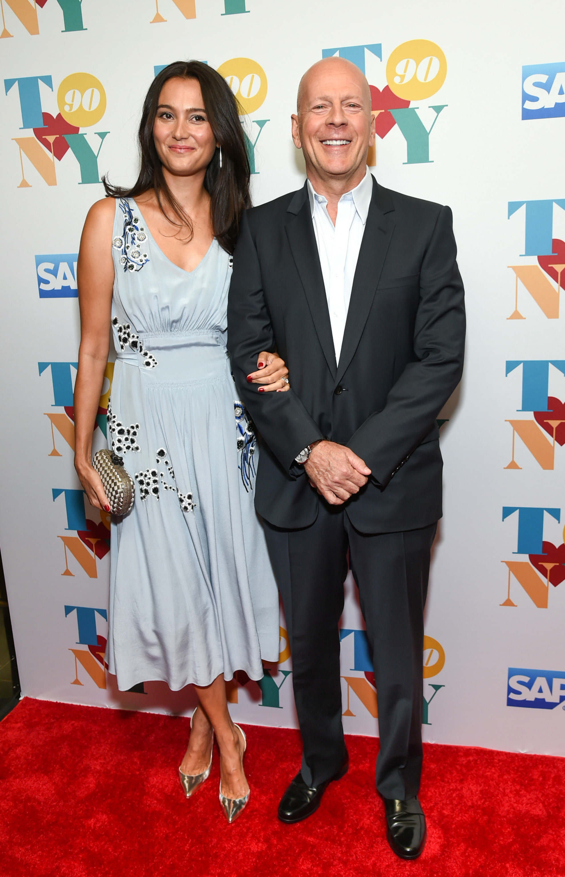 Bruce Willis, right, and wife Emma Heming