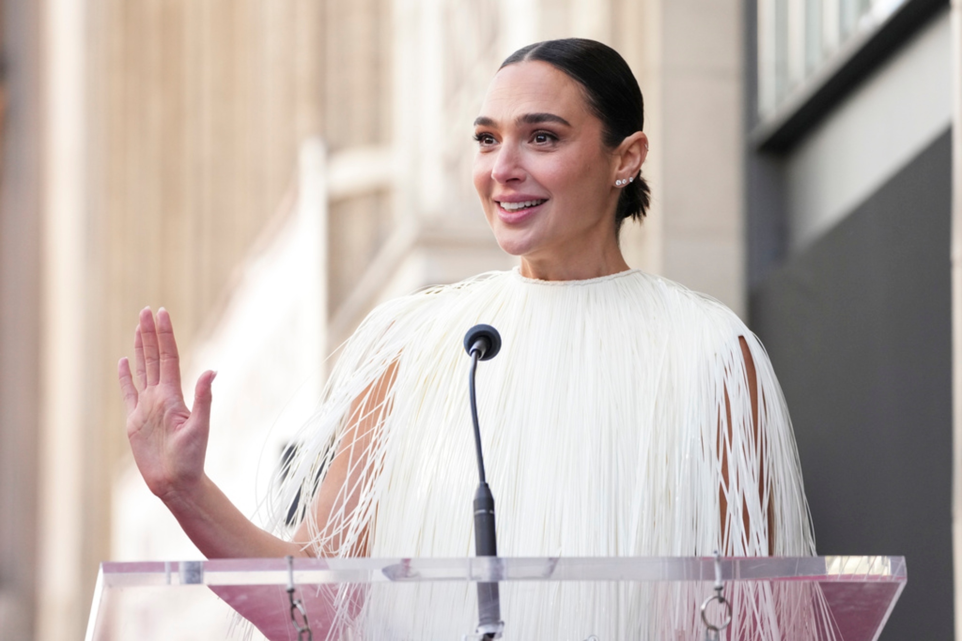 Gal Gadot speaks at a ceremony honoring her with a star on the Hollywood Walk of Fame.