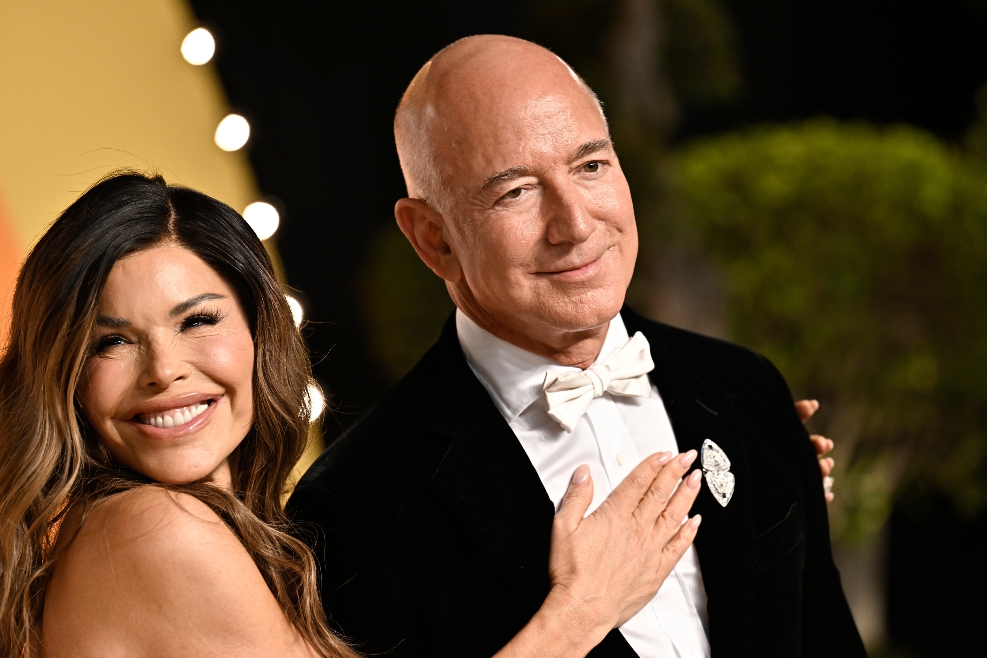 Lauren Sanchez and Jeff Bezos arrive at the Vanity Fair Oscar Party.