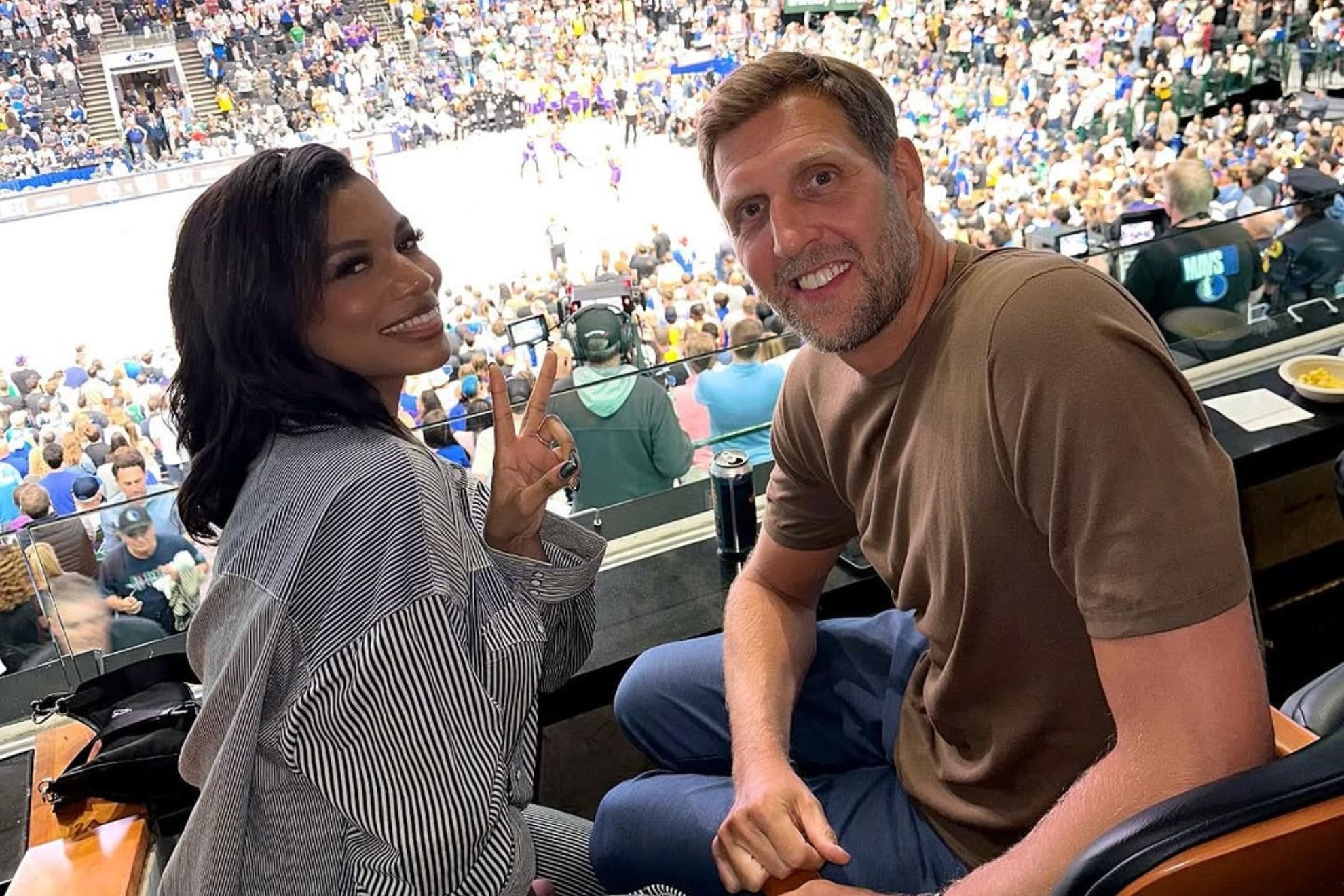 Taylor Rooks and Dirk Nowitzki during Lakers game