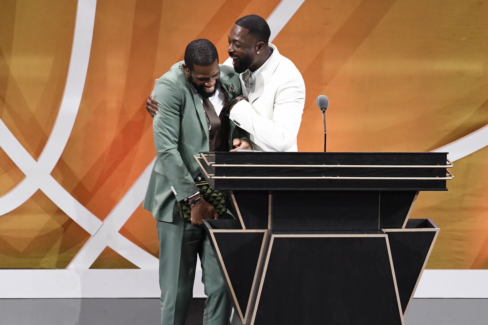 Dwyane Wade and his father during his enshrinement at the Basketball Hall of Fame, Saturday, Aug. 12, 2023.