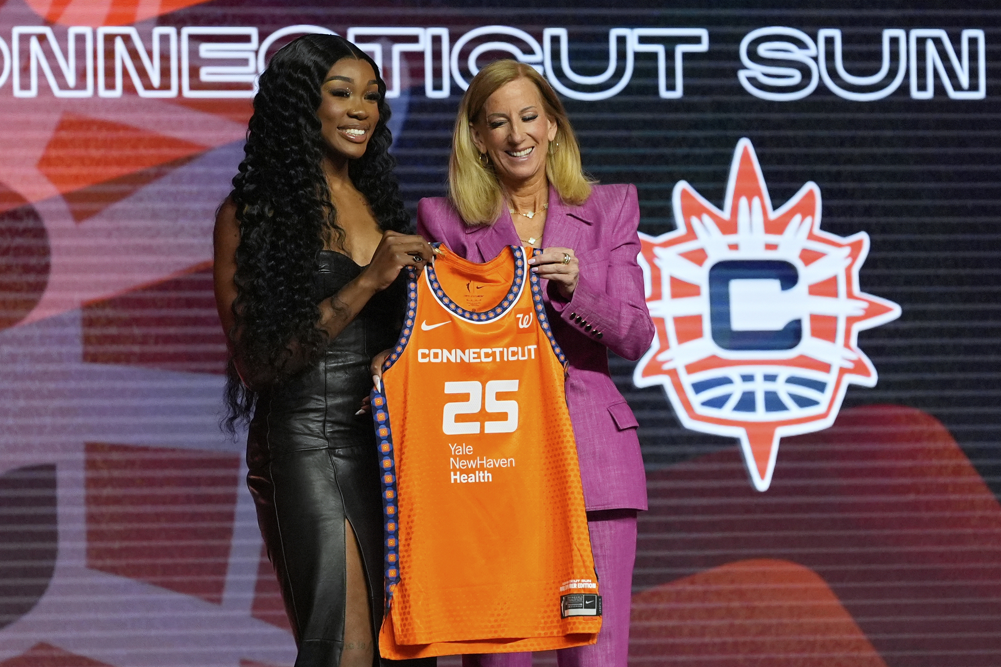Aneesah Morrow, left, poses with WNBA commissioner Cathy Engelbert after being selected seventh overall by the Connecticut Sun