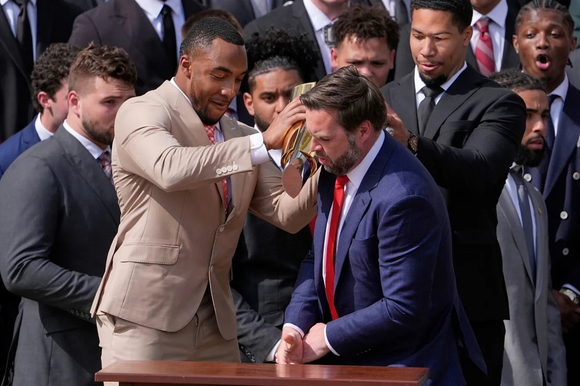 Moment when the trophy falls to JD Vance