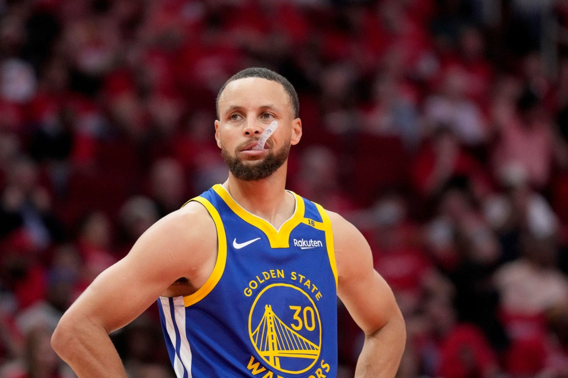 Golden State Warriors guard Stephen Curry (30) chews his mouth guard during the second half of Game 2 of an NBA basketball first-round playoff series against the Houston Rockets in Houston, Wednesday, April 23, 2025. The Rockets beat the Golden State Warriors 109-92. (AP Photo/Karen Warren)