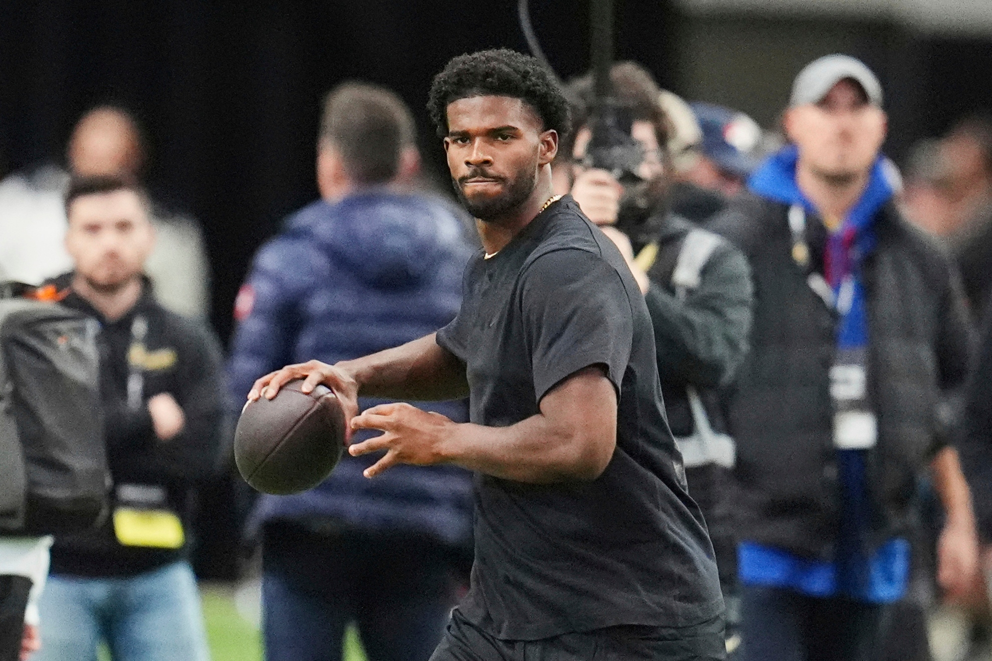 Shedeur Sanders takes part in passing drills during Colorados NFL football pro day.