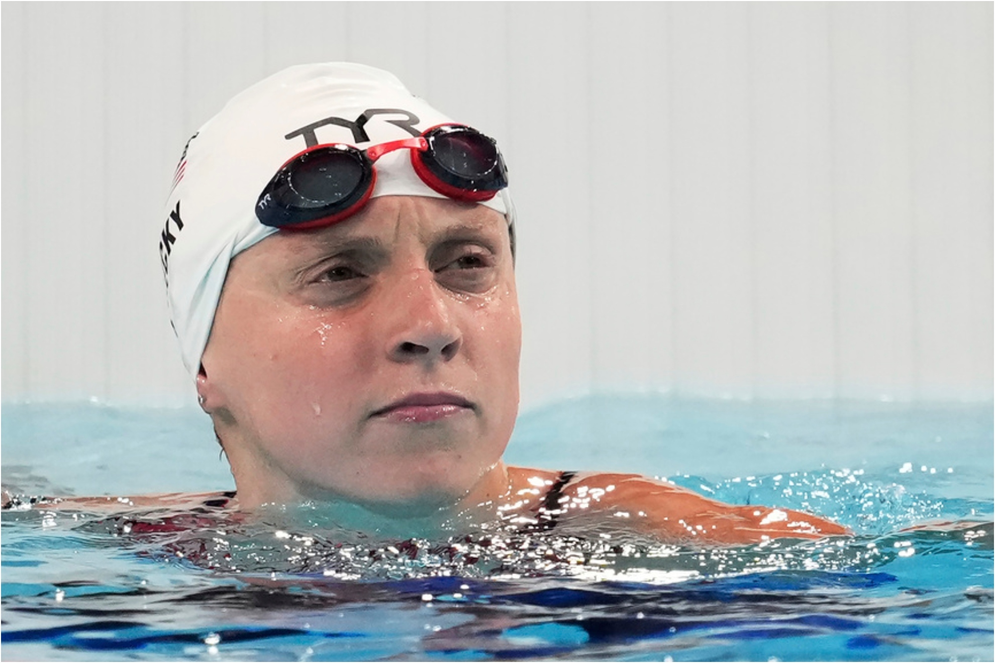 United States Katie Ledecky looks at the board after winning a womens 800-meter freestyle heat at the Summer Olympics.