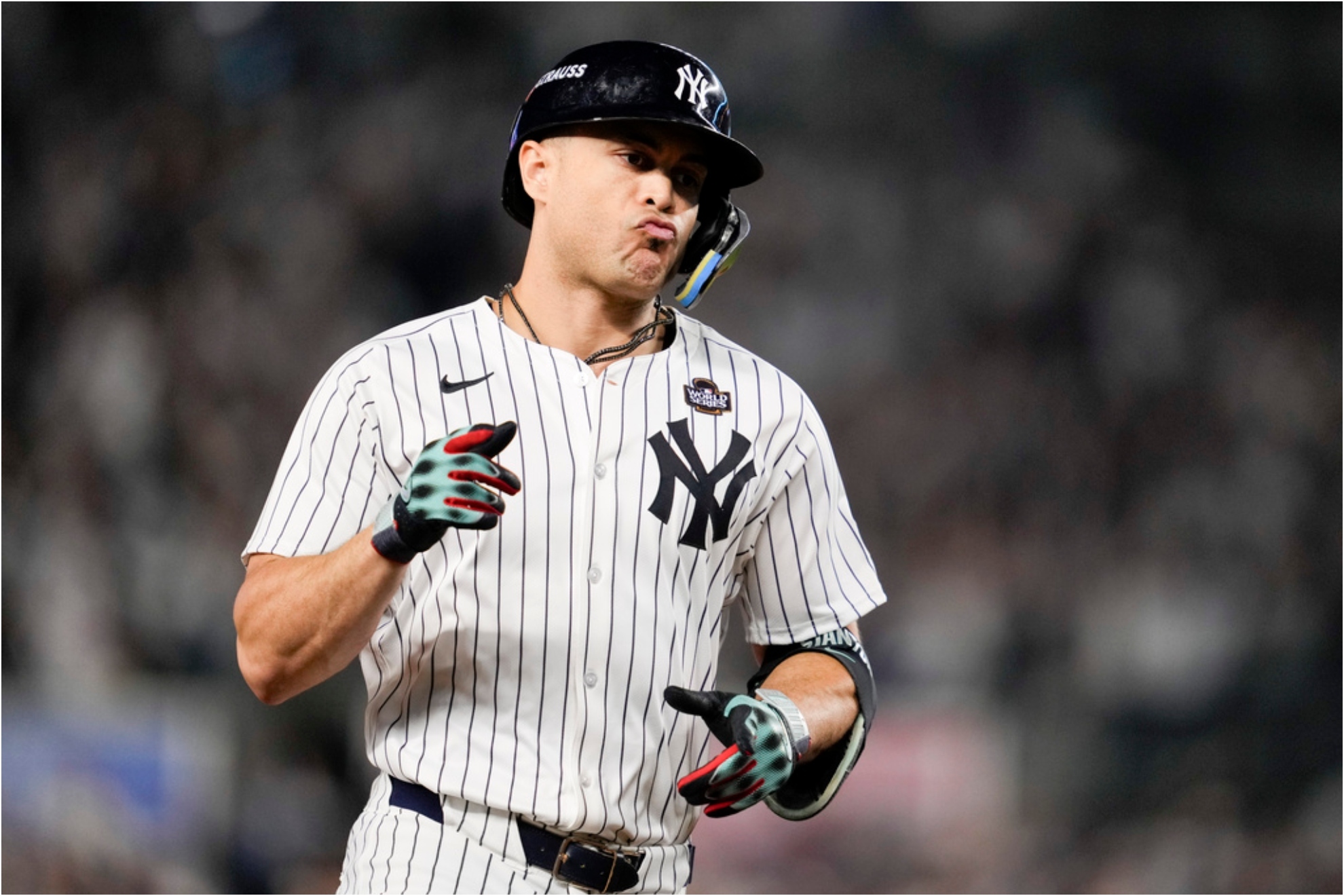 New York Yankees Giancarlo Stanton celebrates a home run.