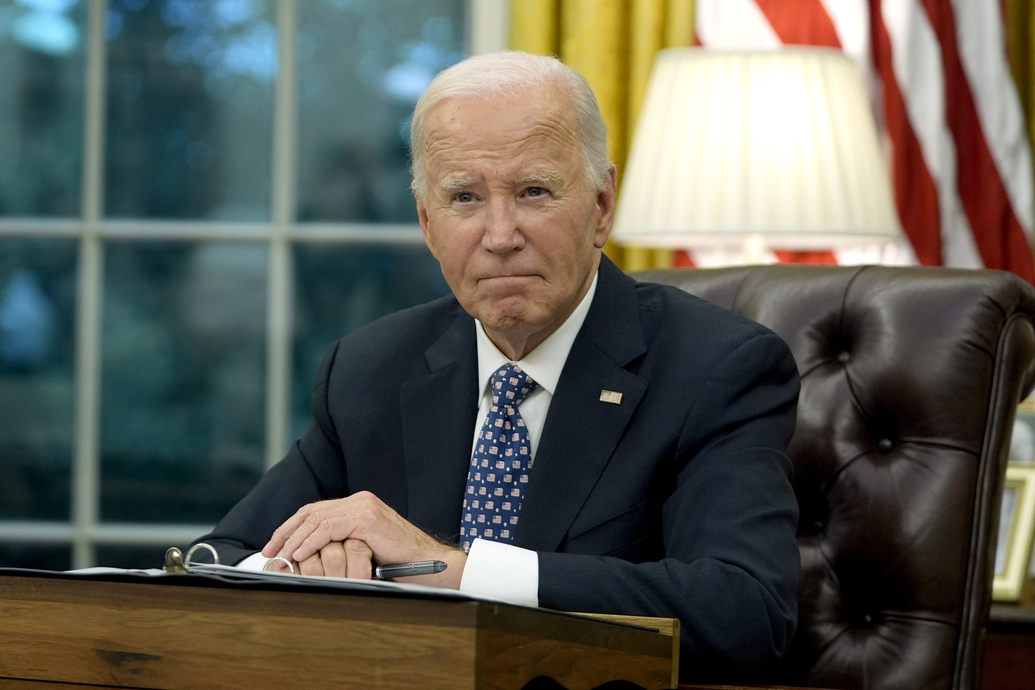 Presiden Joe Biden lspeaks from the Oval Office of the White House in Washington, Sept. 30, 2024. (AP Photo/Mark Schiefelbein, File)