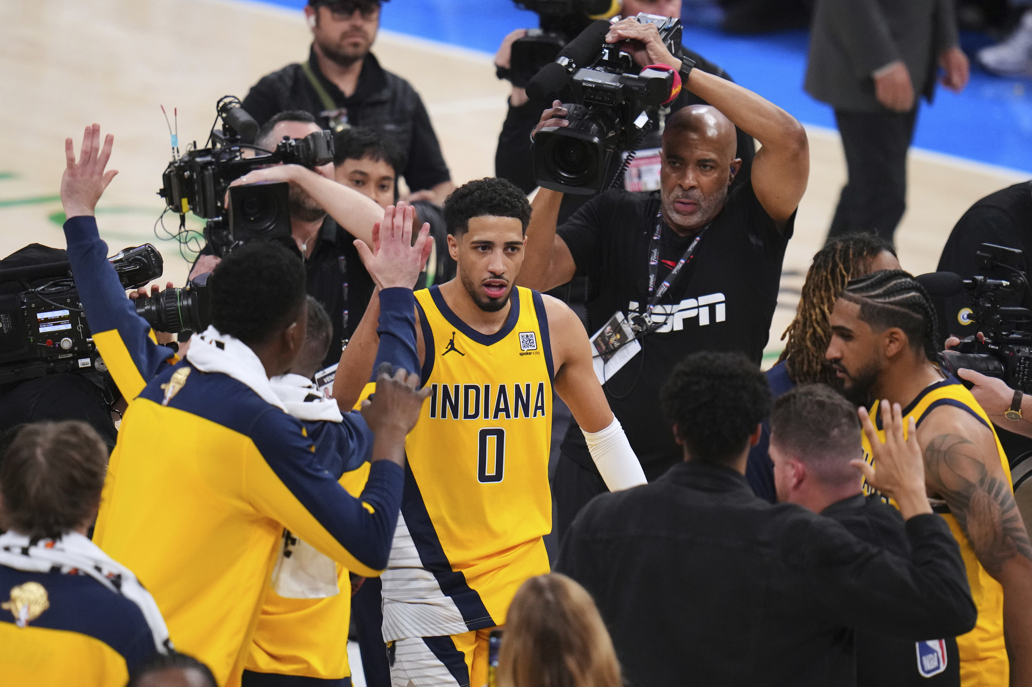 Indiana Pacers guard Tyrese Haliburton (0) leaves the court after winning Game 1 of the NBA Finals basketball series against the Oklahoma City Thunder Thursday, June 5, 2025, in Oklahoma City. (AP Photo/Julio Cortez)