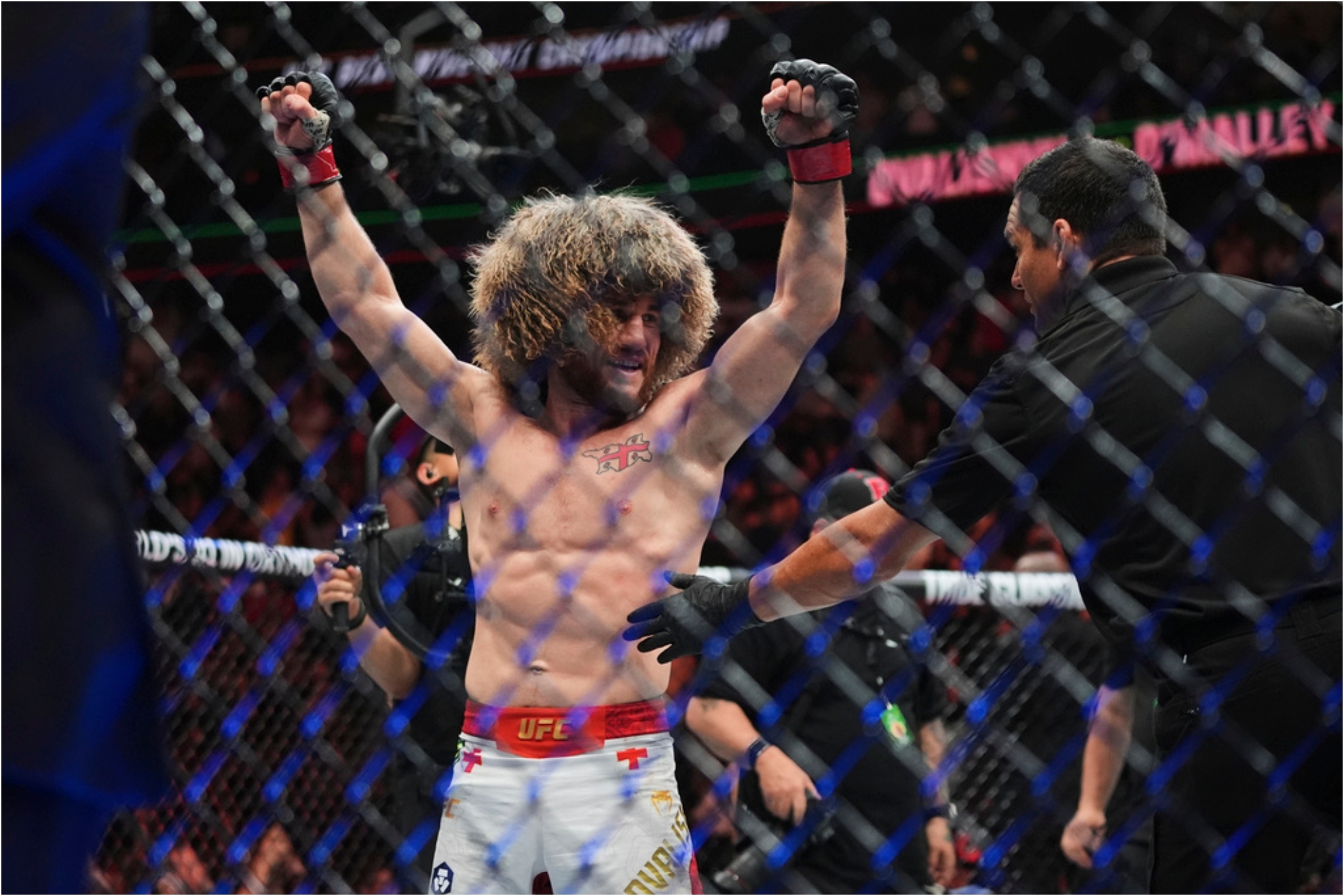 Georgias Merab Dvalishvili celebrates after a bantamweight title bout against Sean OMalley at the UFC 316.