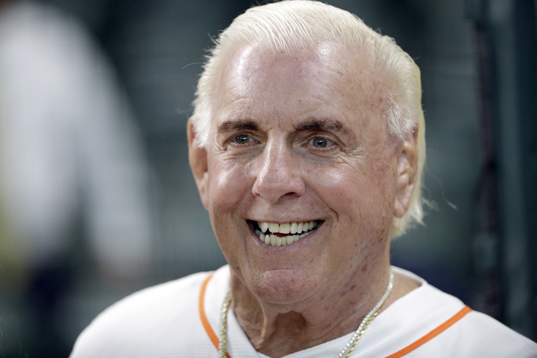 Former professional wrestler Ric Flair waits to throw out the ceremonial first pitch before a baseball game between the Detroit Tigers and Houston Astros