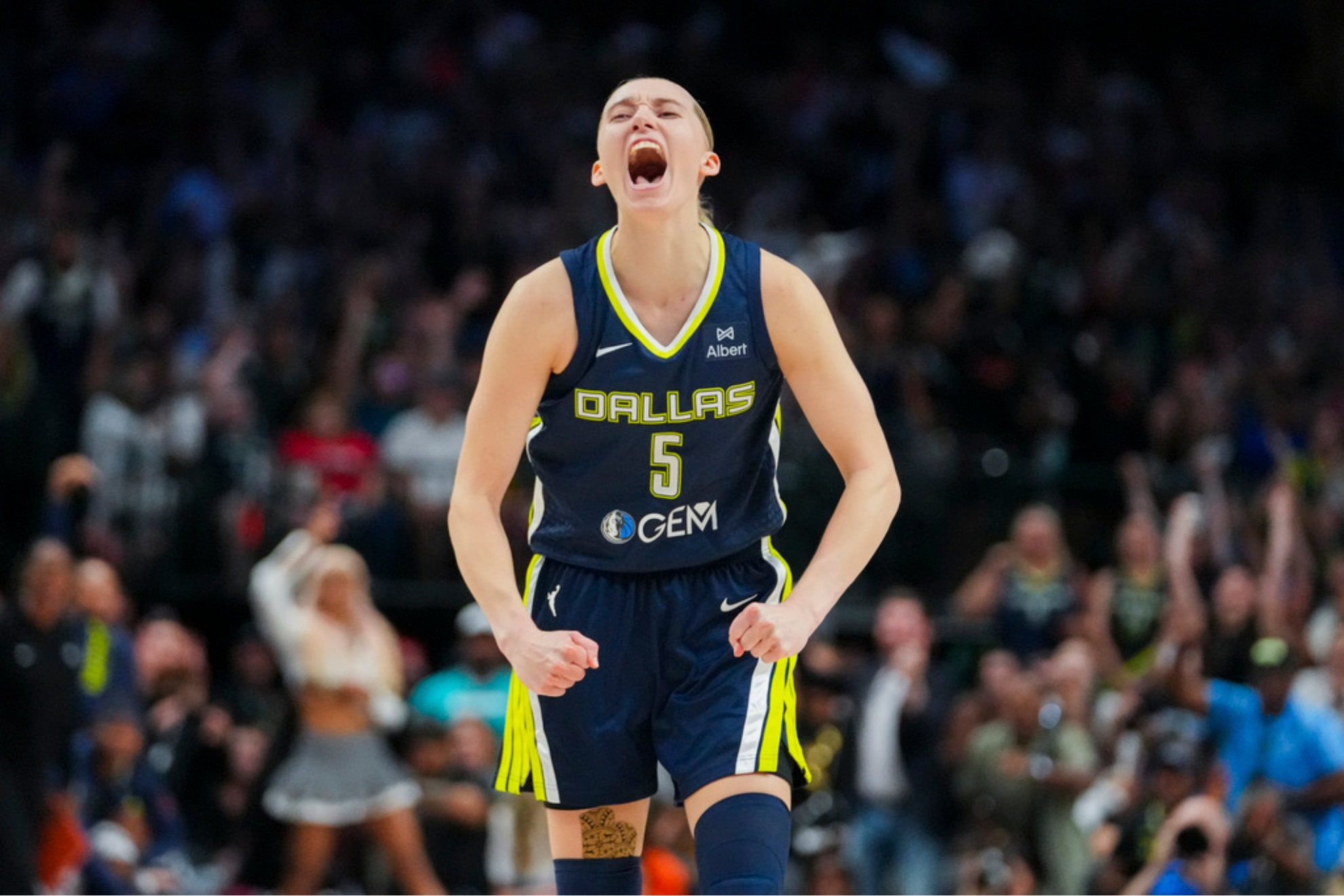 Dallas Wings guard Paige Bueckers reacts after making a basket