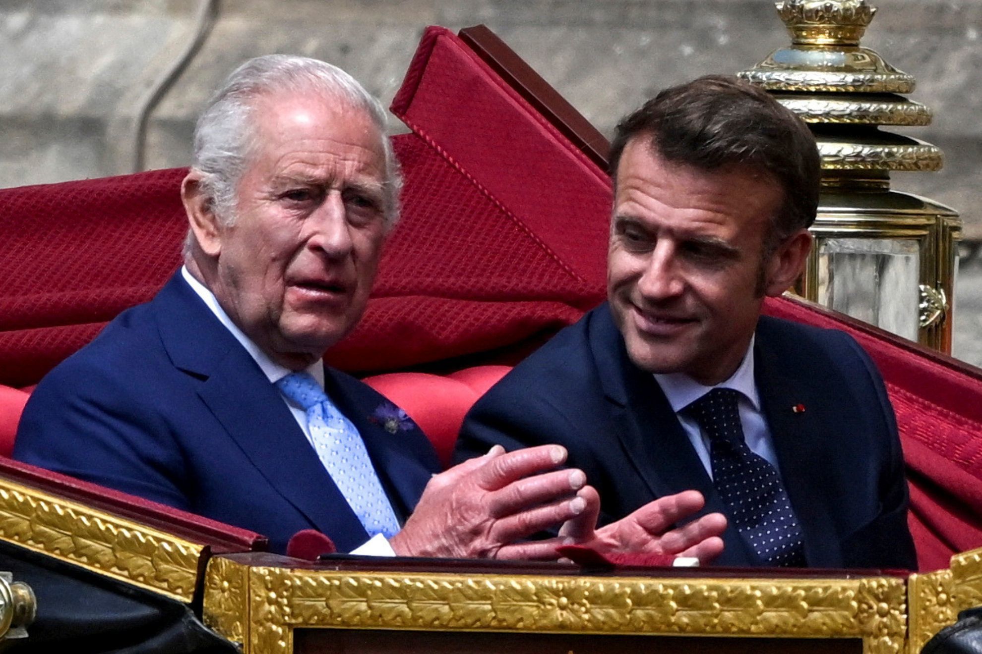 King Charles III witnesses an uncomfortable moment as President Macrons wife Brigitte breaks protocol