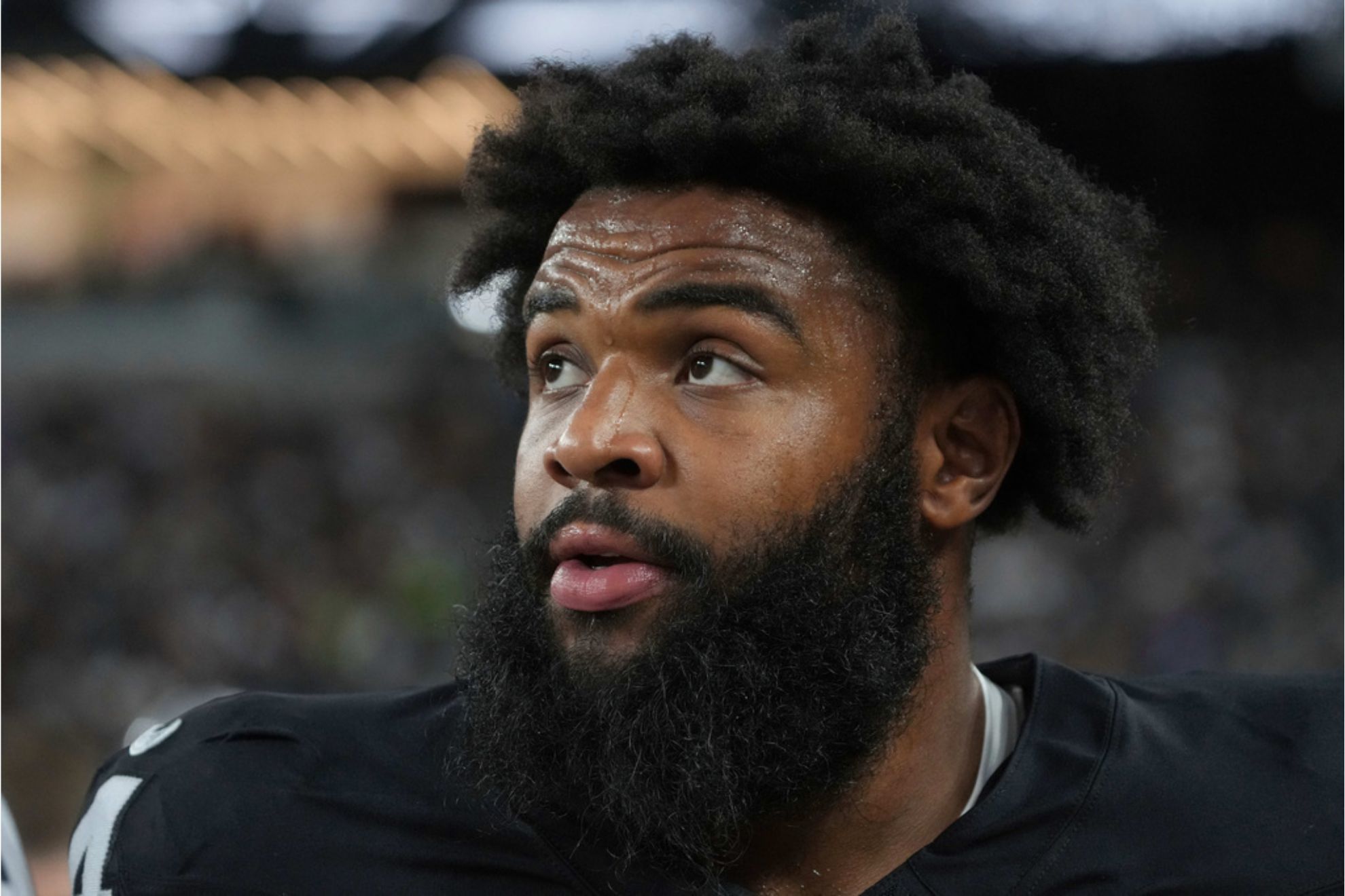 Las Vegas Raiders defensive tackle Christian Wilkins looks on during the first half of an NFL preseason football game