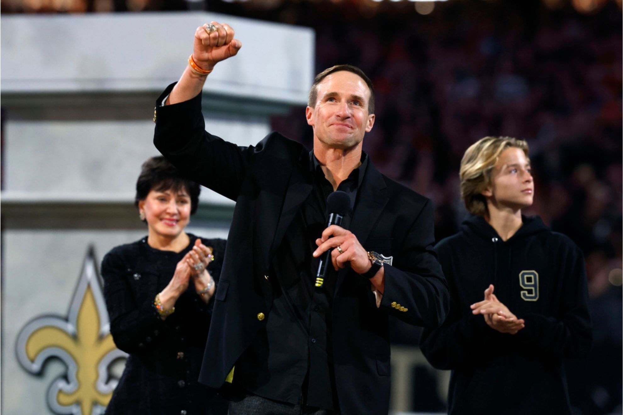 Former New Orleans Saints quarterback Drew Brees celebrates his induction in the Saints Hall of Fame