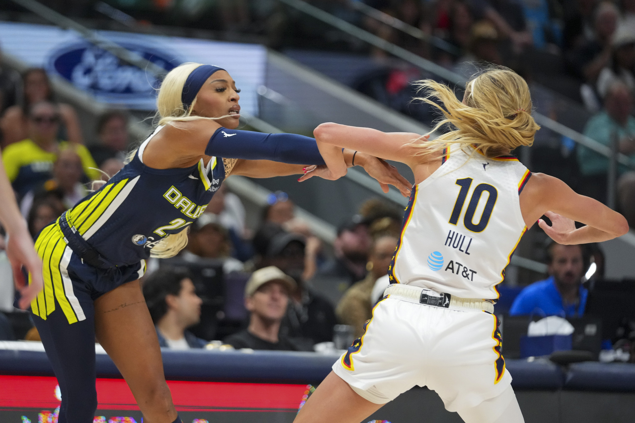 DiJonai Carrington left, has been traded to the Minnesota Lynx in exchange for two other players, who are heading to the Dallas Wings. (AP Photo/Julio Cortez)