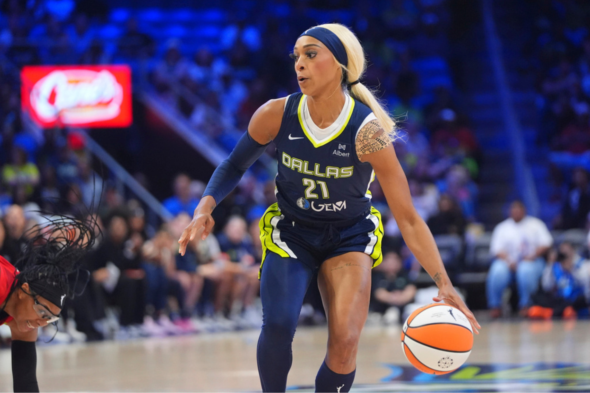 Former Dallas Wings guard DiJonai Carrington