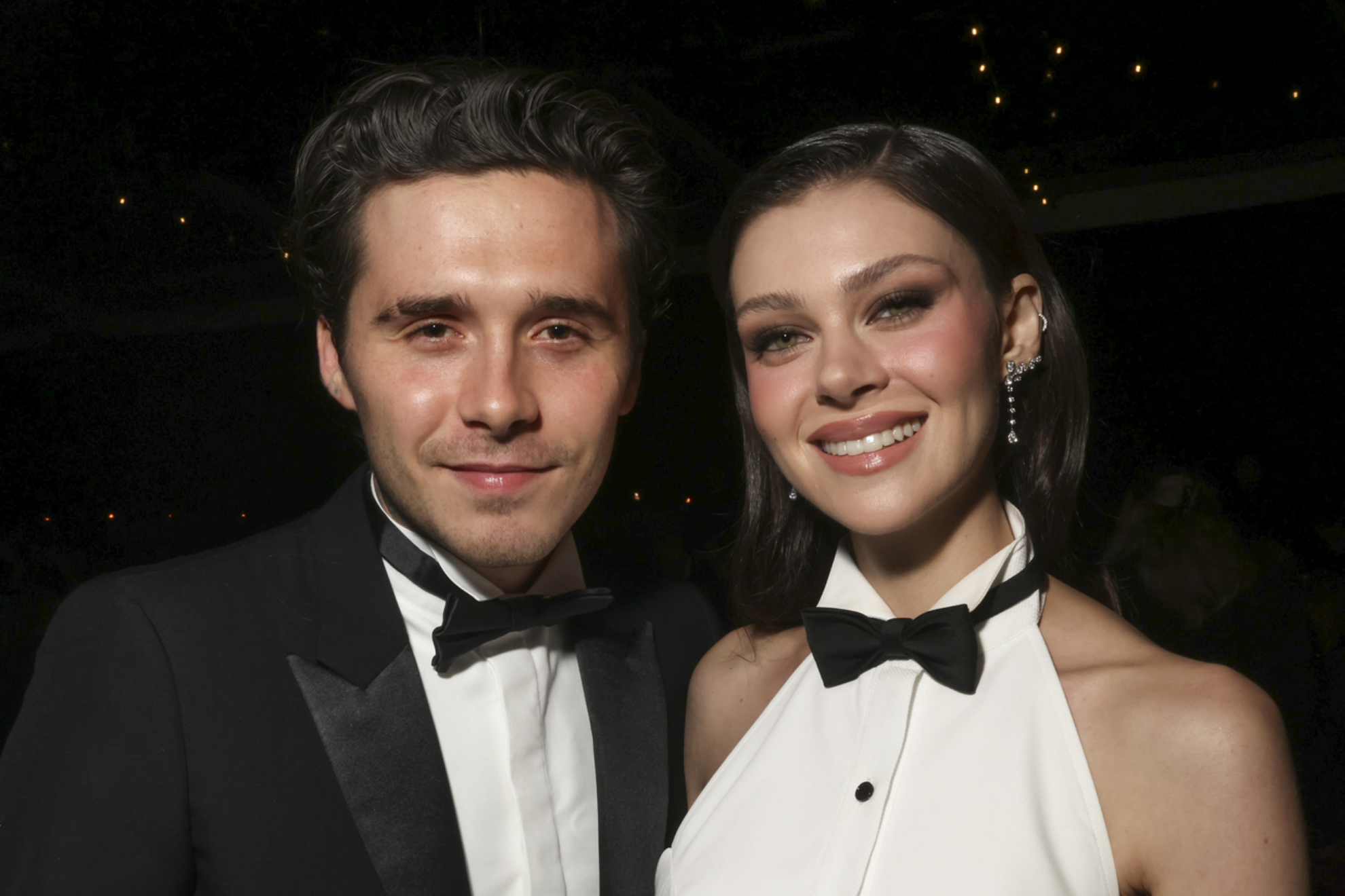 Brooklyn Beckham and Nicola Peltz renew their vows, but their family feud with David and Victoria rages on