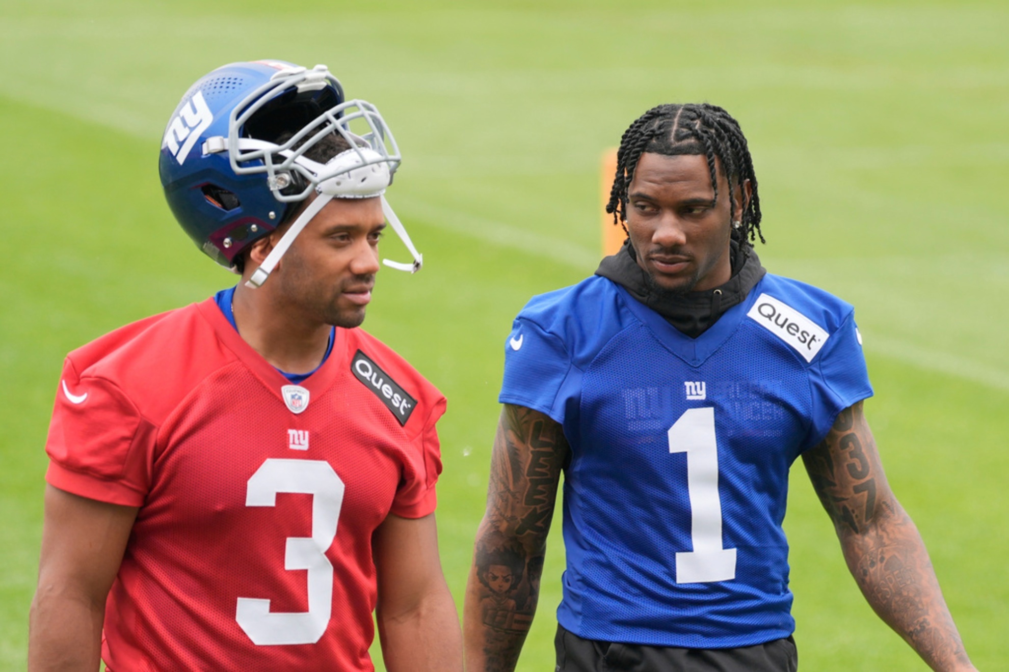 Russell Wilson (L) and Malik Nabers will have the Giants offense on their shoulders.