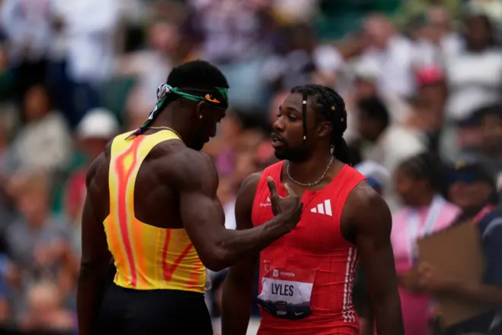 Kenny Bednarek shakes hands with Noah Lyles after the 200m final at the US trials.