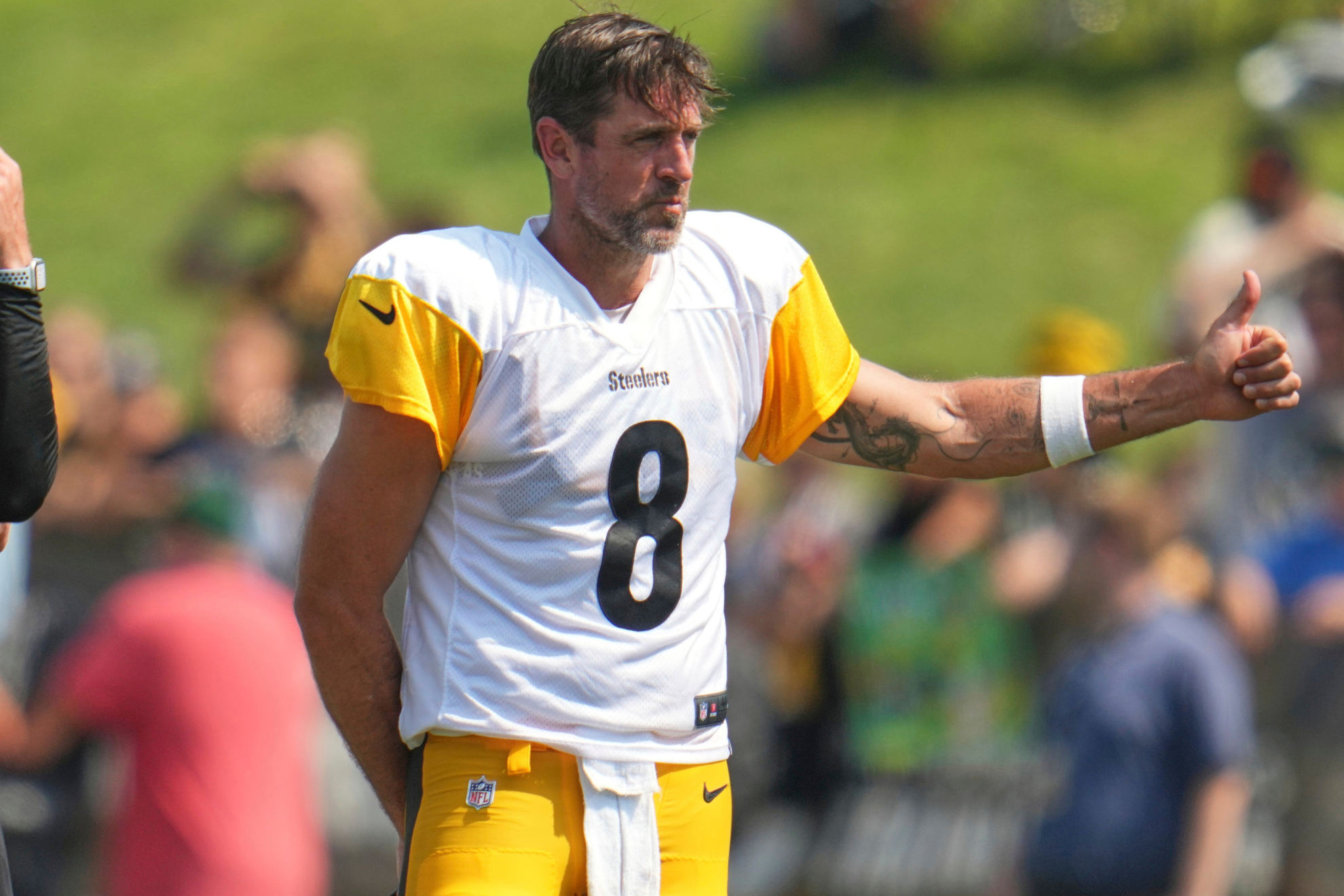 Aaron Rodgers watches on during a Pittsburgh Steelers training camp practice.