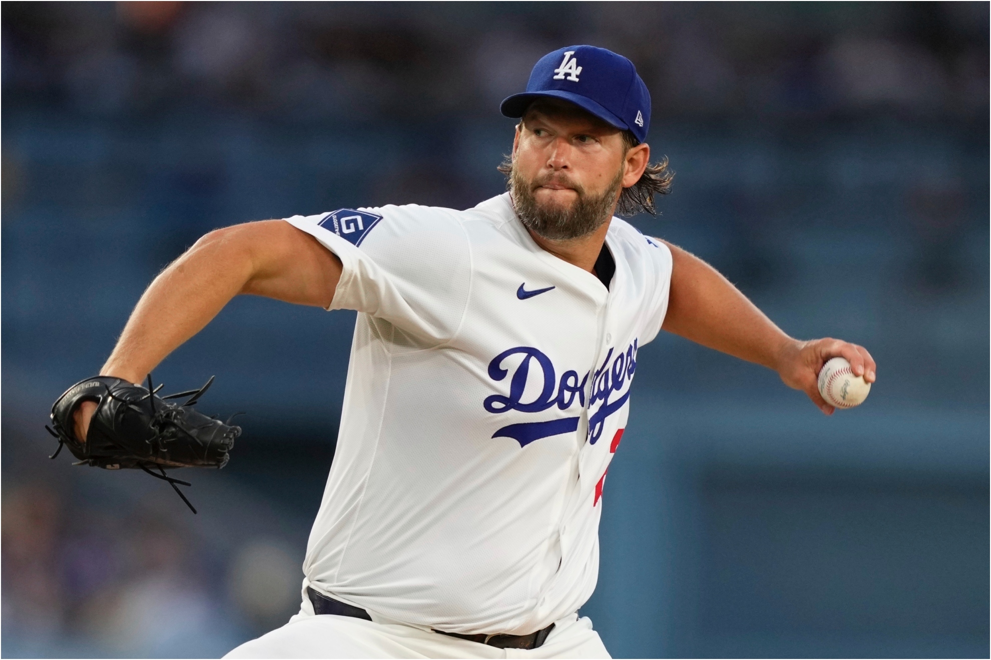 Los Angeles Dodgers starting pitcher Clayton Kershaw throws to the plate.