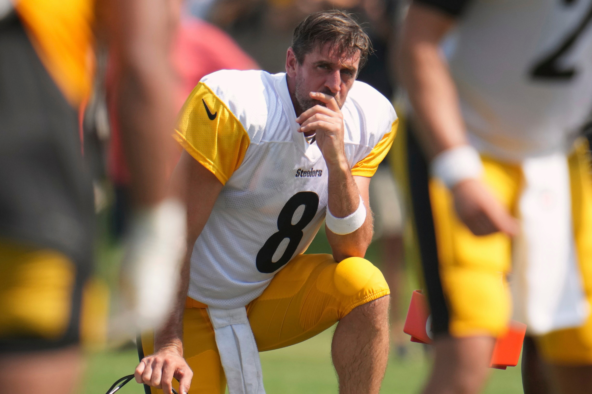 Aaron Rodgers looks on, concerned, during a Pittsburgh Steelers training camp practice.