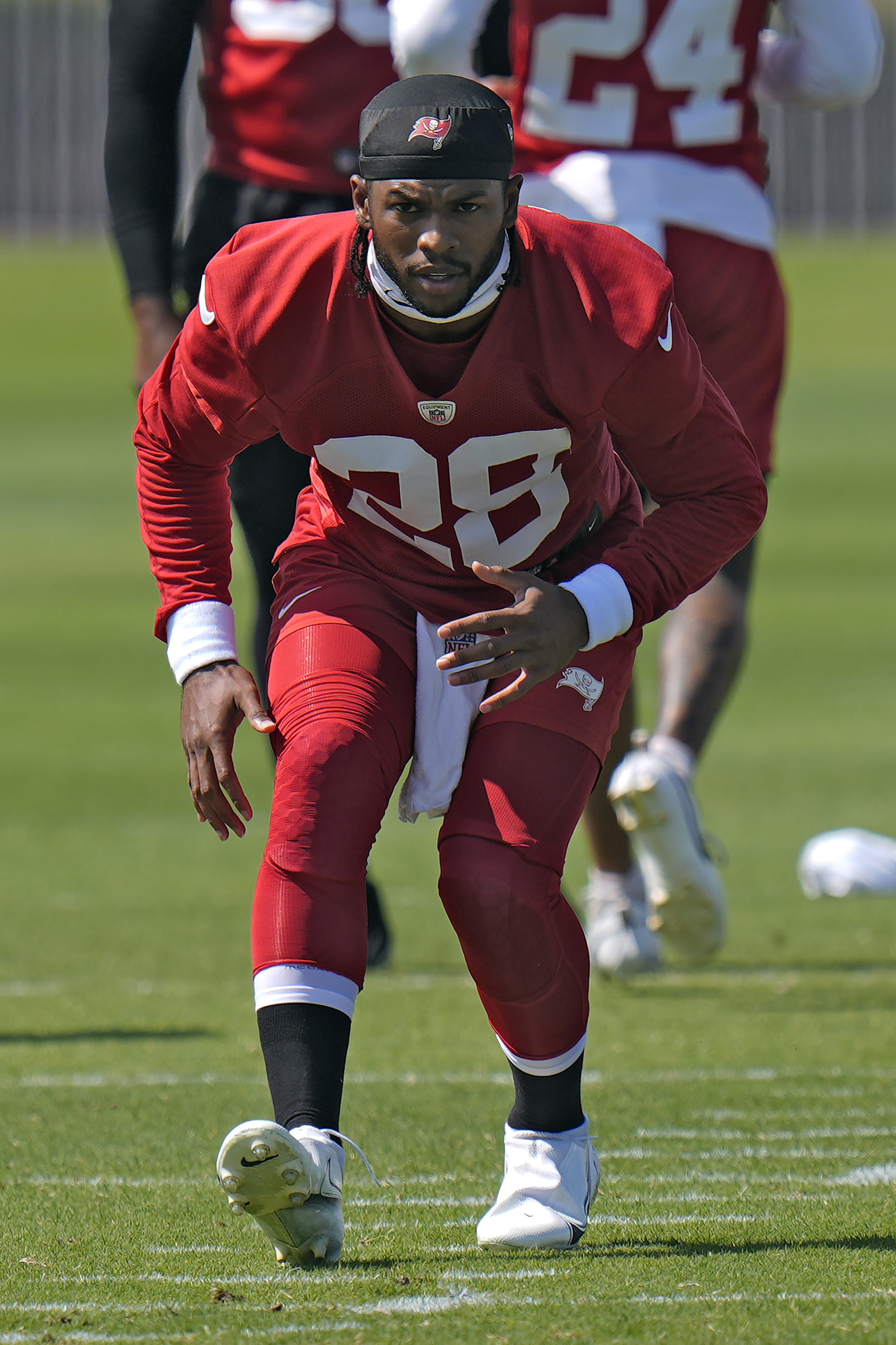 Tampa Bay Buccaneers safety Shilo Sanders runs backwards during an NFL football practice