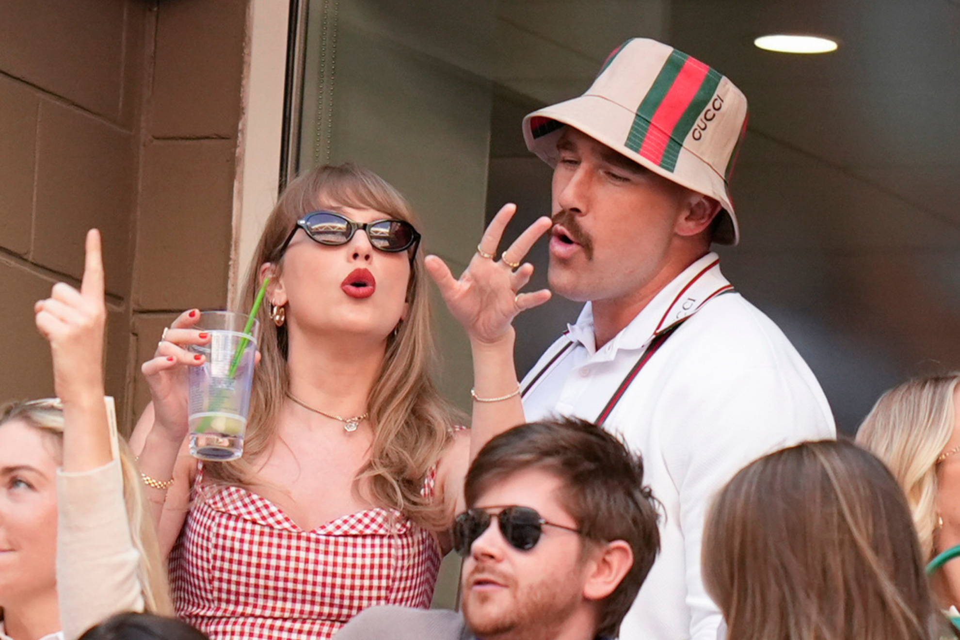 Taylor Swift and Kansas City Chiefs tight end Travis Kelce watch