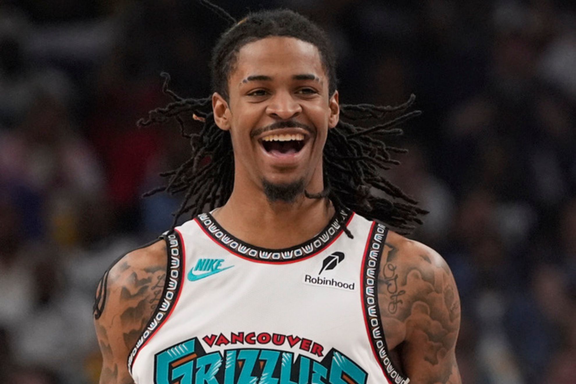 Memphis Grizzlies guard Ja Morant celebrates during the first half of an NBA play-in tournament basketball game