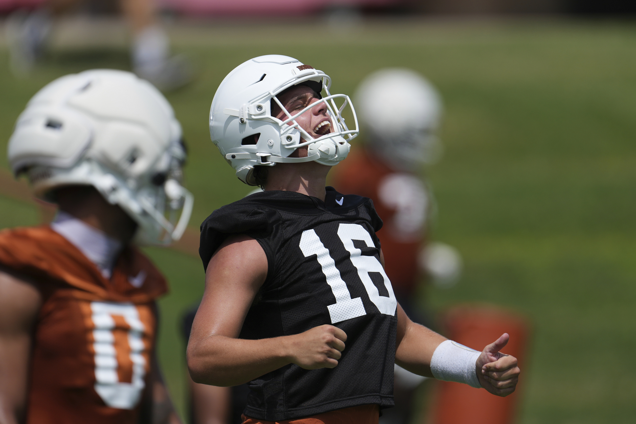 Texas quarterback Arch Manning (16) reacts during an NCAA college football practice in Austin, Texas