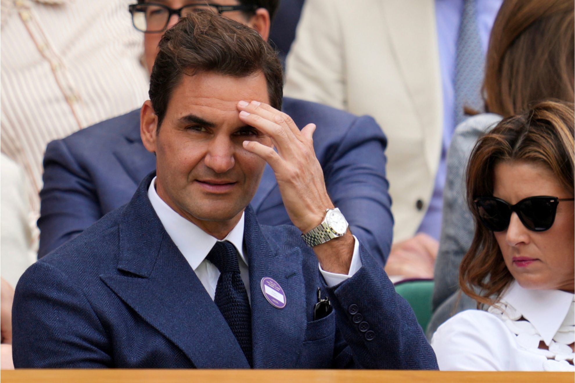 Tennis legend Roger Federer and his wife Mirka sit in the Royal Box on Centre Court on day eight of the Wimbledon Tennis Championships