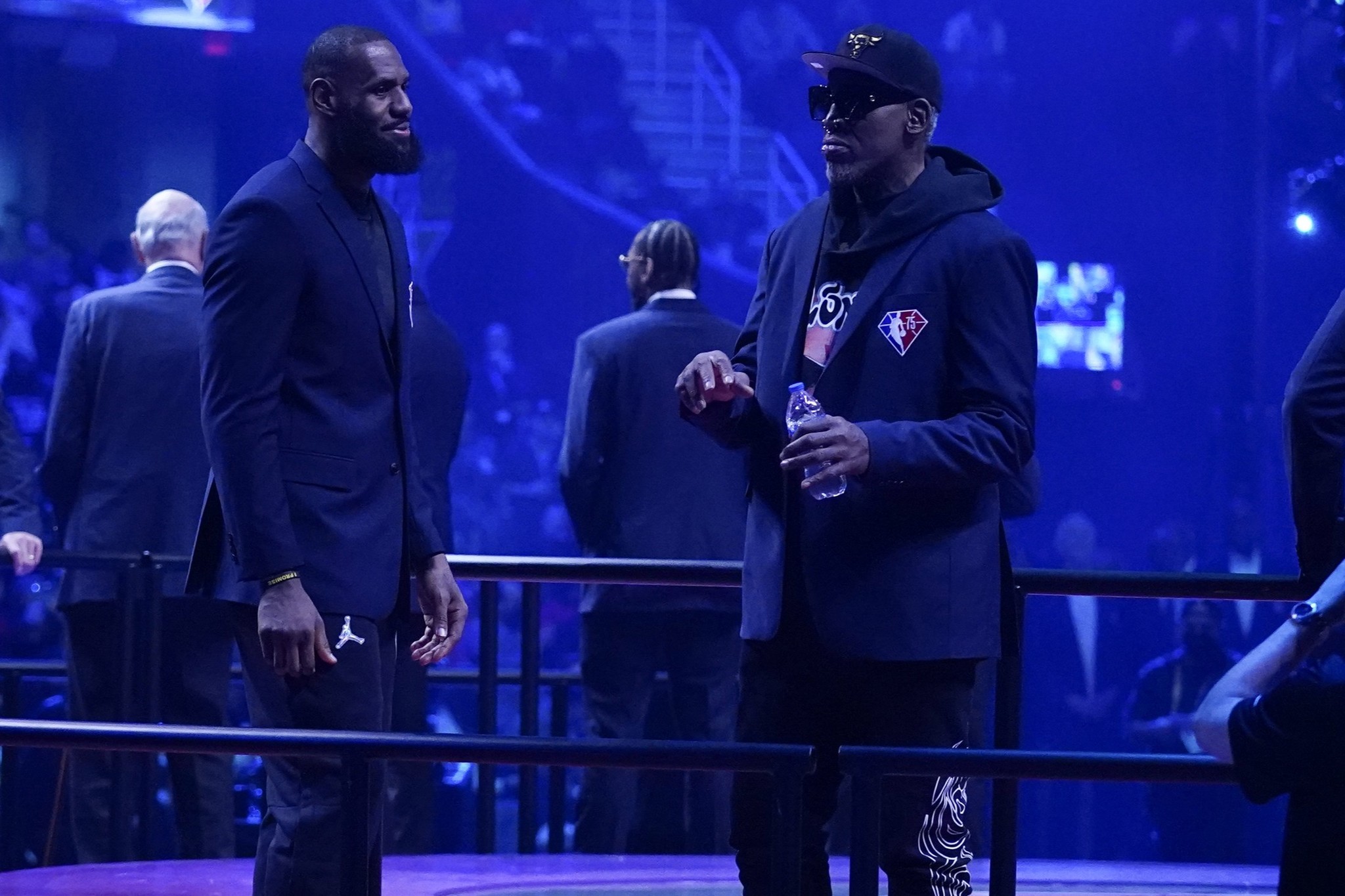 Los Angeles Lakers LeBron James, left, greets former NBA player Dennis Rodman during the introduction of 75 of the leagues greatest players