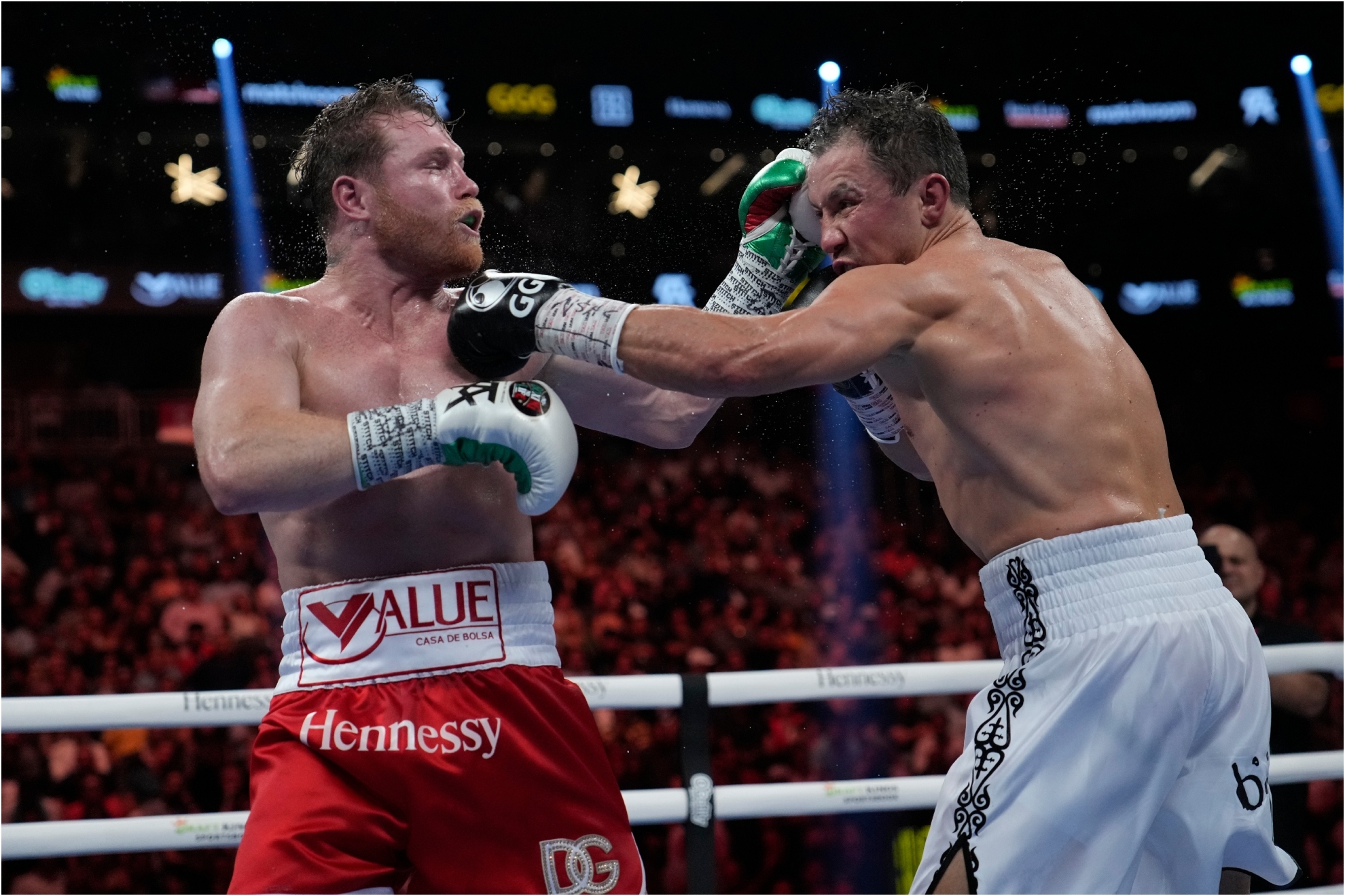 Canelo Alvarez, left, fights Gennady Golovkin in a super middleweight title boxing match.