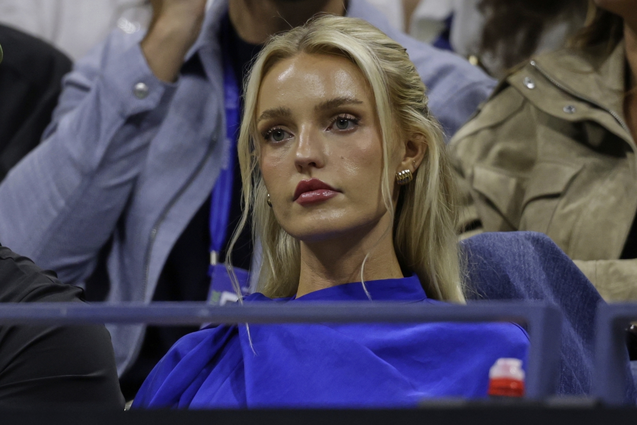 Morgan Riddle; watches a match between Taylor Fritz and Novak Djokovic during the quarterfinal round of the U.S. Open