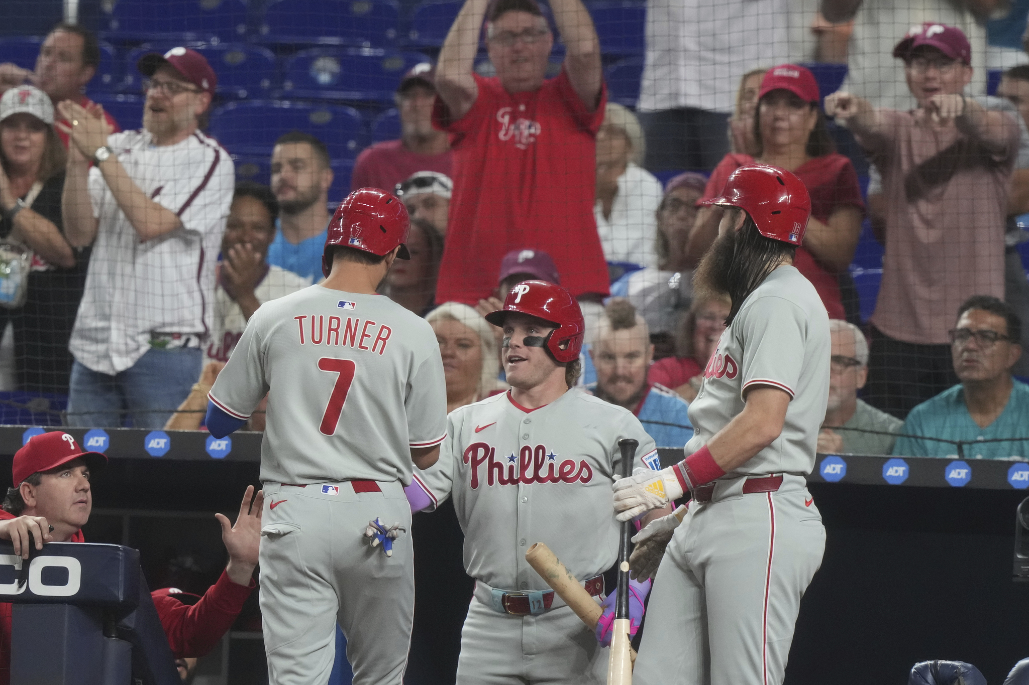 Philadelphia Phillies Trea Turner (7) scores on a hit by Bryce Harper during the first inning