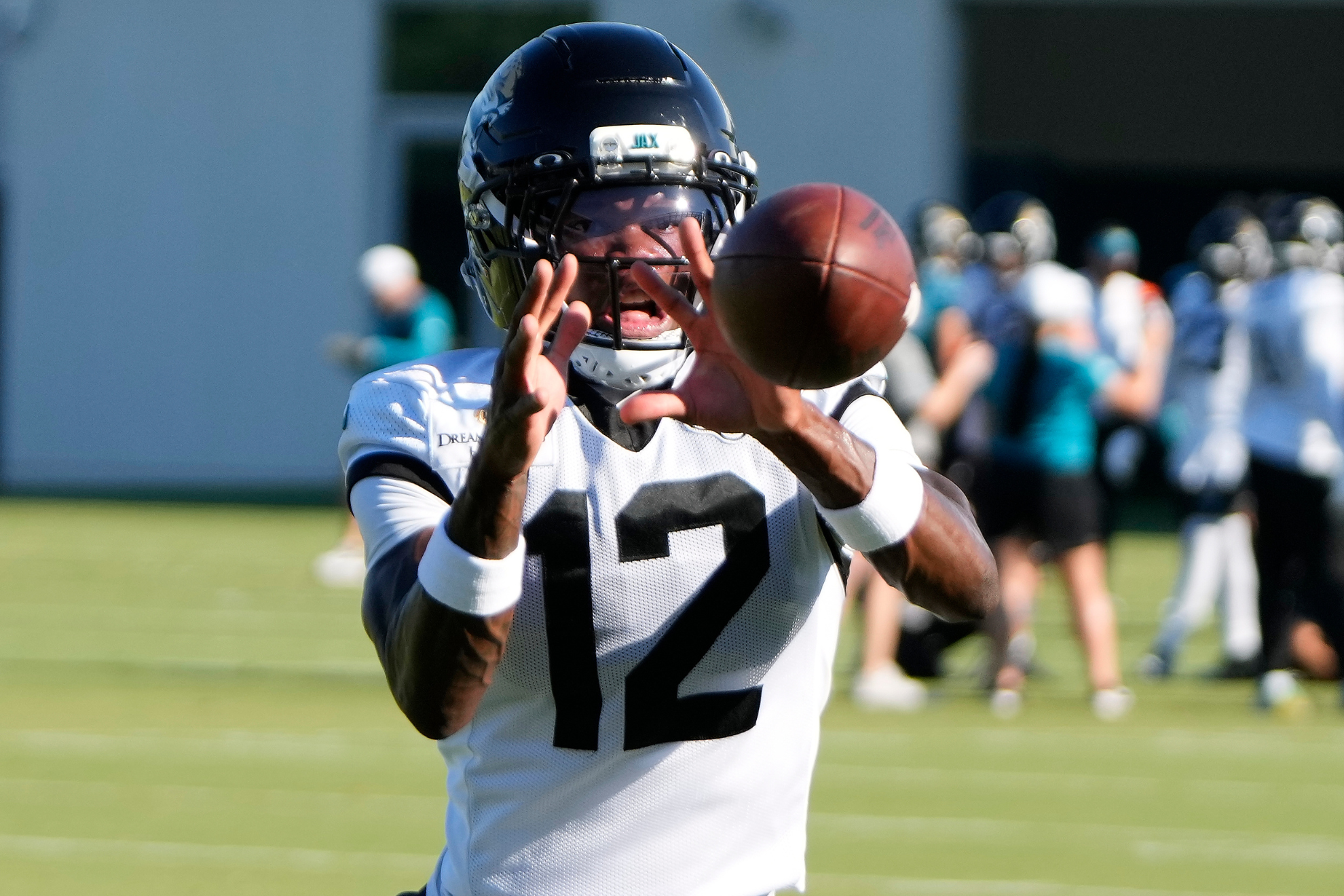 Travis Hunter catches a pass during Jacksonville Jaguars practice.