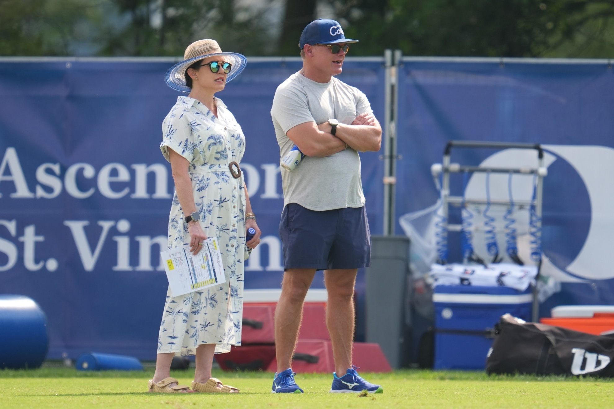 Carlie Irsay-Gordon (L) talks with general manager Chris Ballard during Colts training camp.