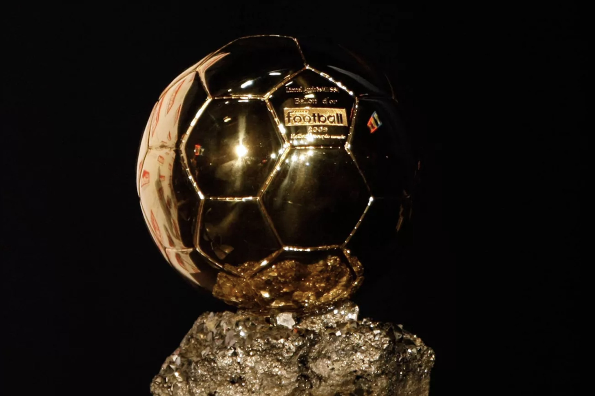 How much is the Ballon dOr worth, what is it made of, who designed it and how much does it weigh?