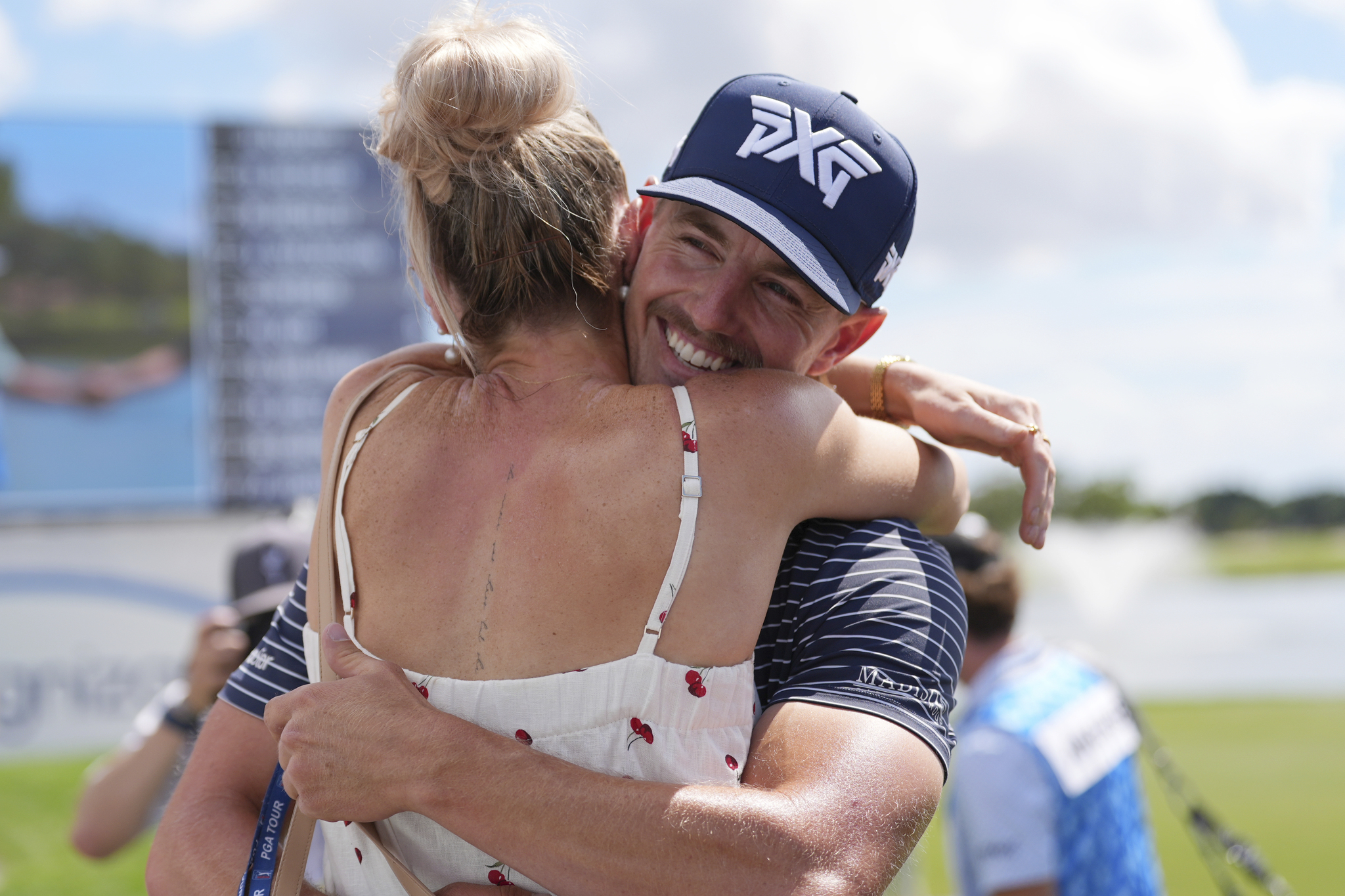 Jake Knapp gets a hug from girlfriend Makena White at the Cognizant Classic golf tournament,, Feb. 27, 2025,