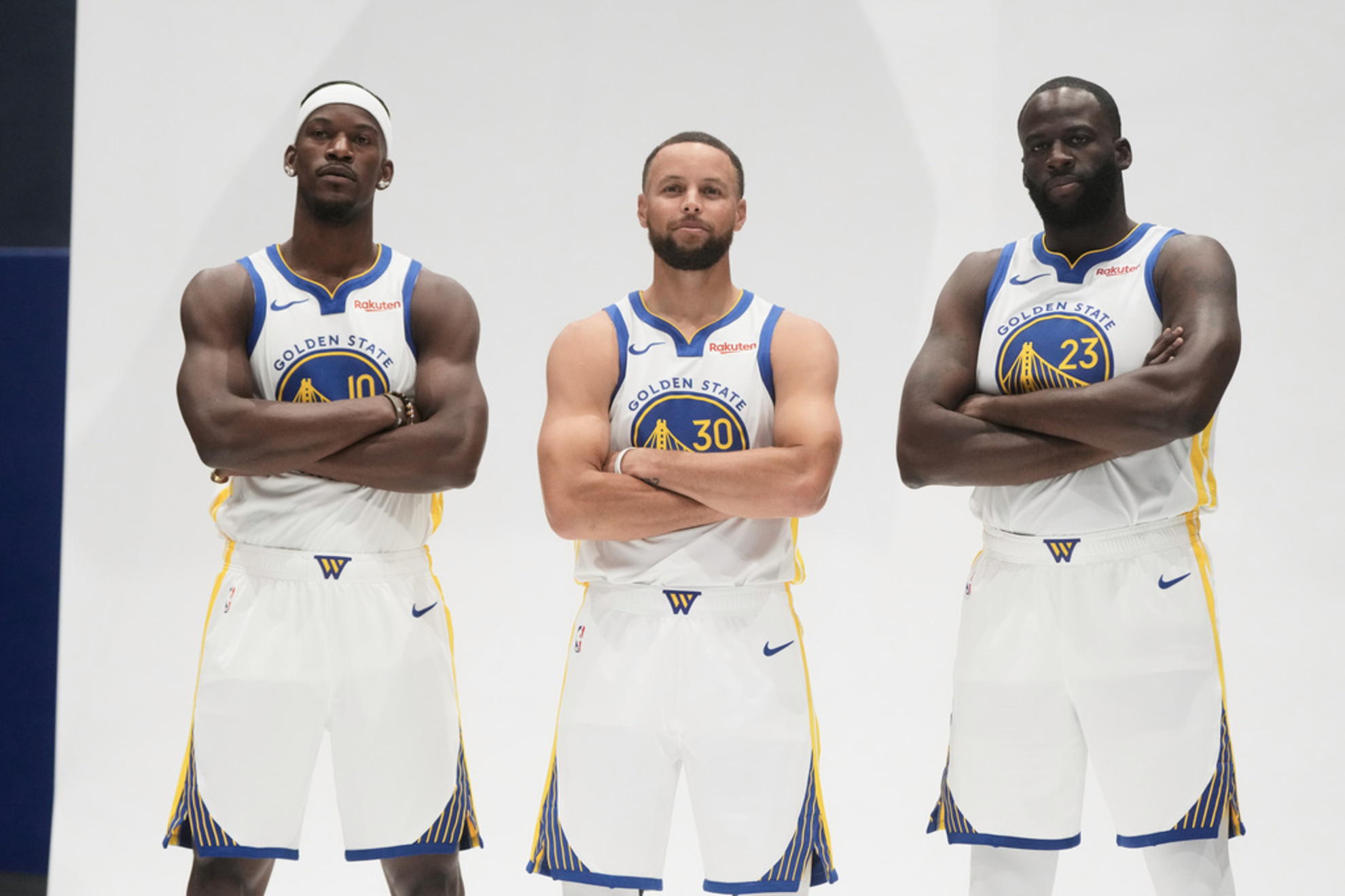 Golden State Warriors forward Jimmy Butler III, guard Stephen Curry and forward Draymond Green