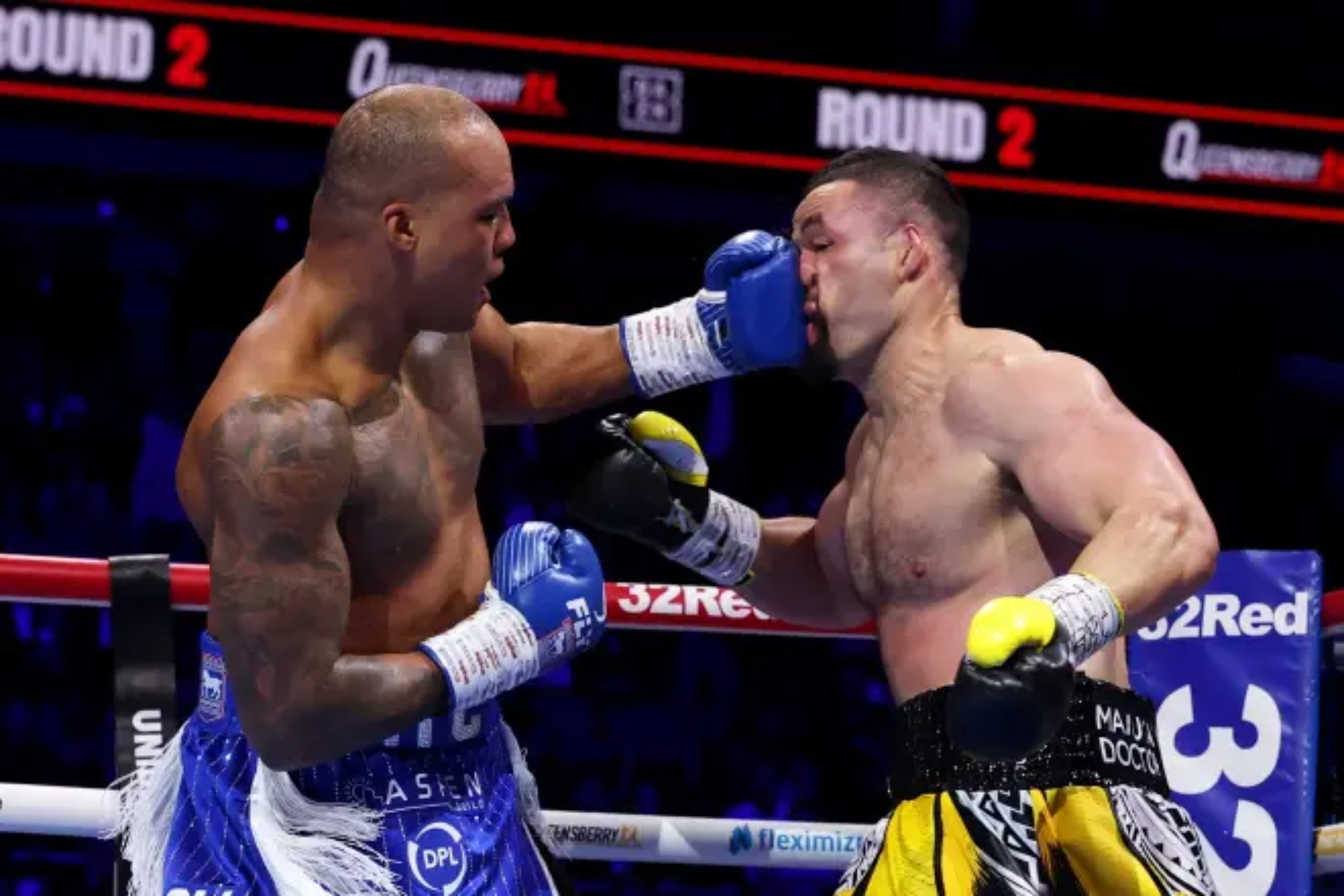Fabio Wardley punches Joseph Parker in the face.