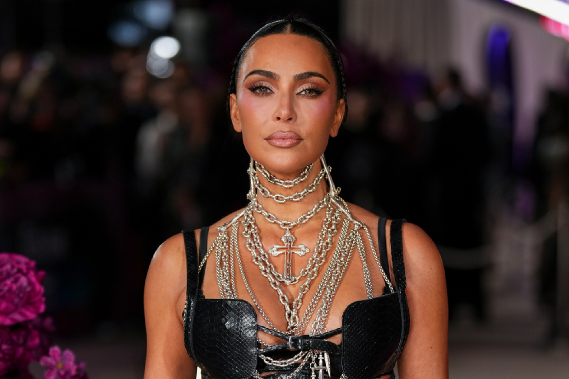 Kim Kardashian poses for photographers upon arrival at the premiere of the television series Alls Fair