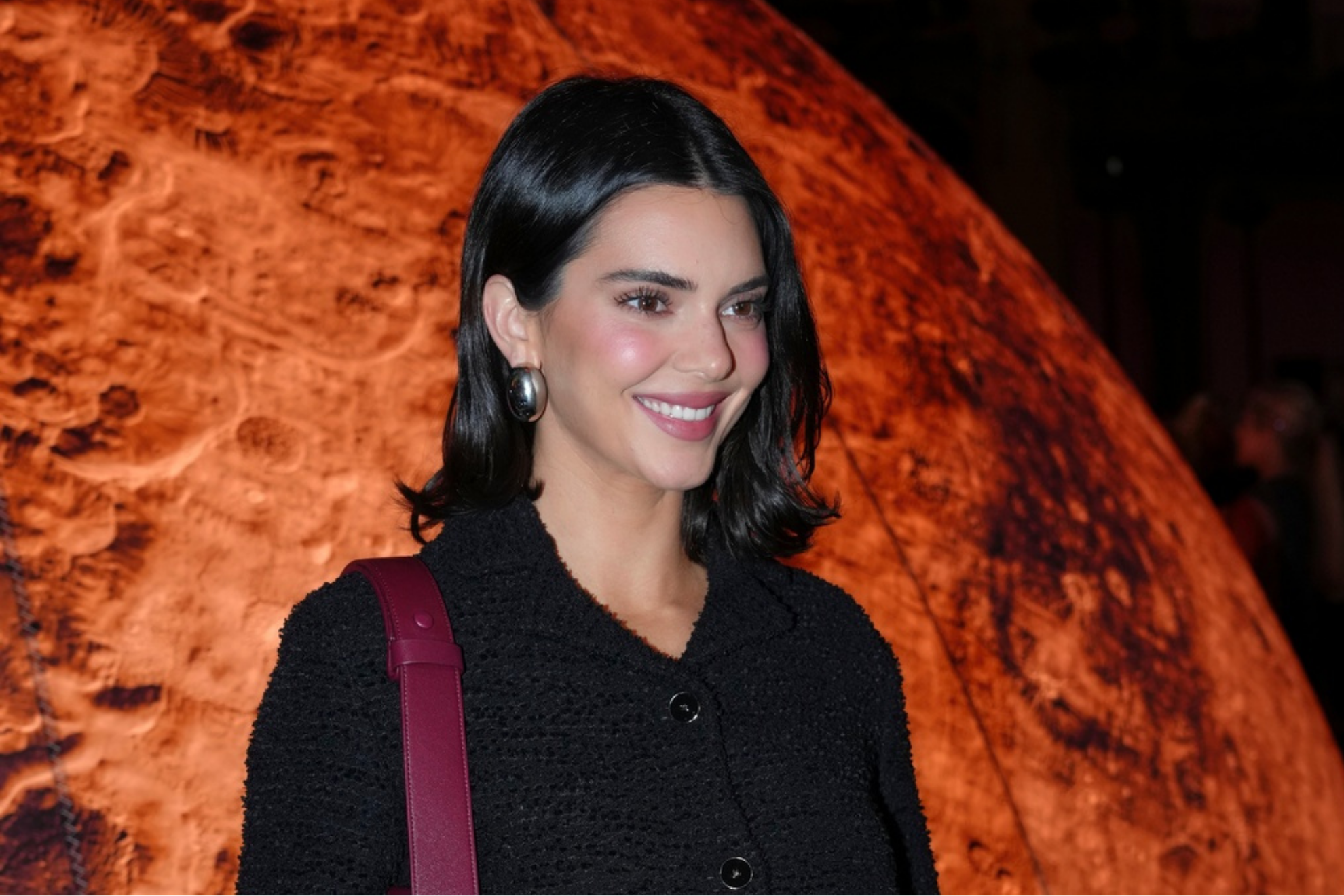 Kendall Jenner poses for photographers upon arrival at the Chanel Spring/Summer 2026 collection presented in Paris