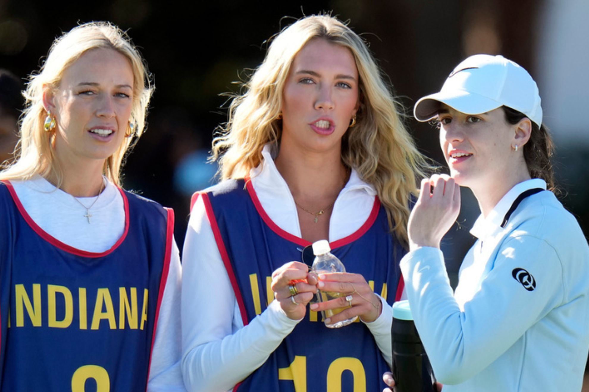 Caitlin Clark gets help from Sophie Cunningham as she battles to win at Celebrity Caddies